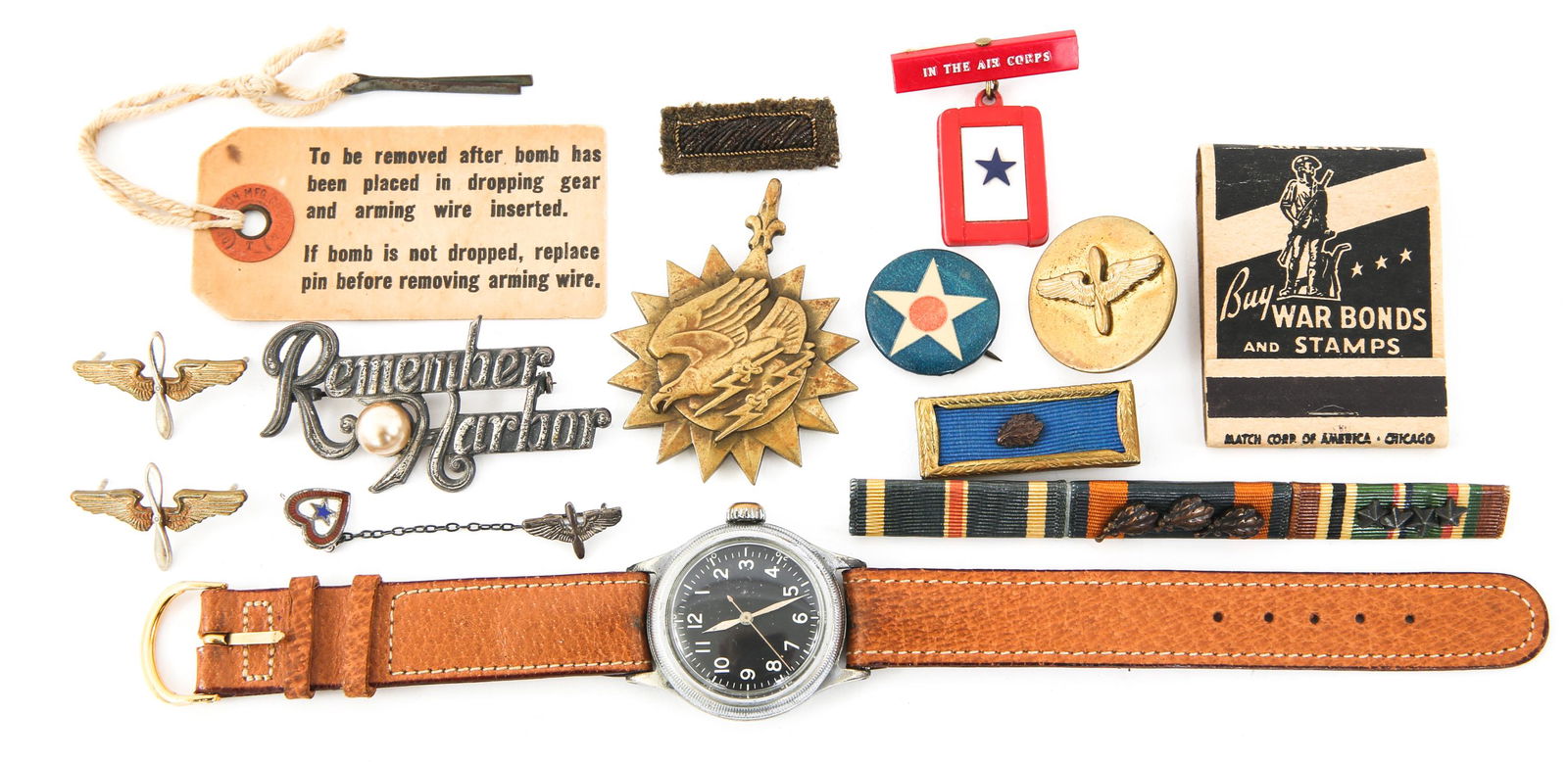 WWII US AAF NAMED GROUPING WITH TYPE A-11 WATCH: WWII US AAF NAMED GROUPING WITH TYPE A-11 WATCH WWII US Army Air Force named grouping. Includes (1) US AAF Type A-11 Bulova watch, serial No. AF-46-219884, working condition. (1) Air medal engraved "