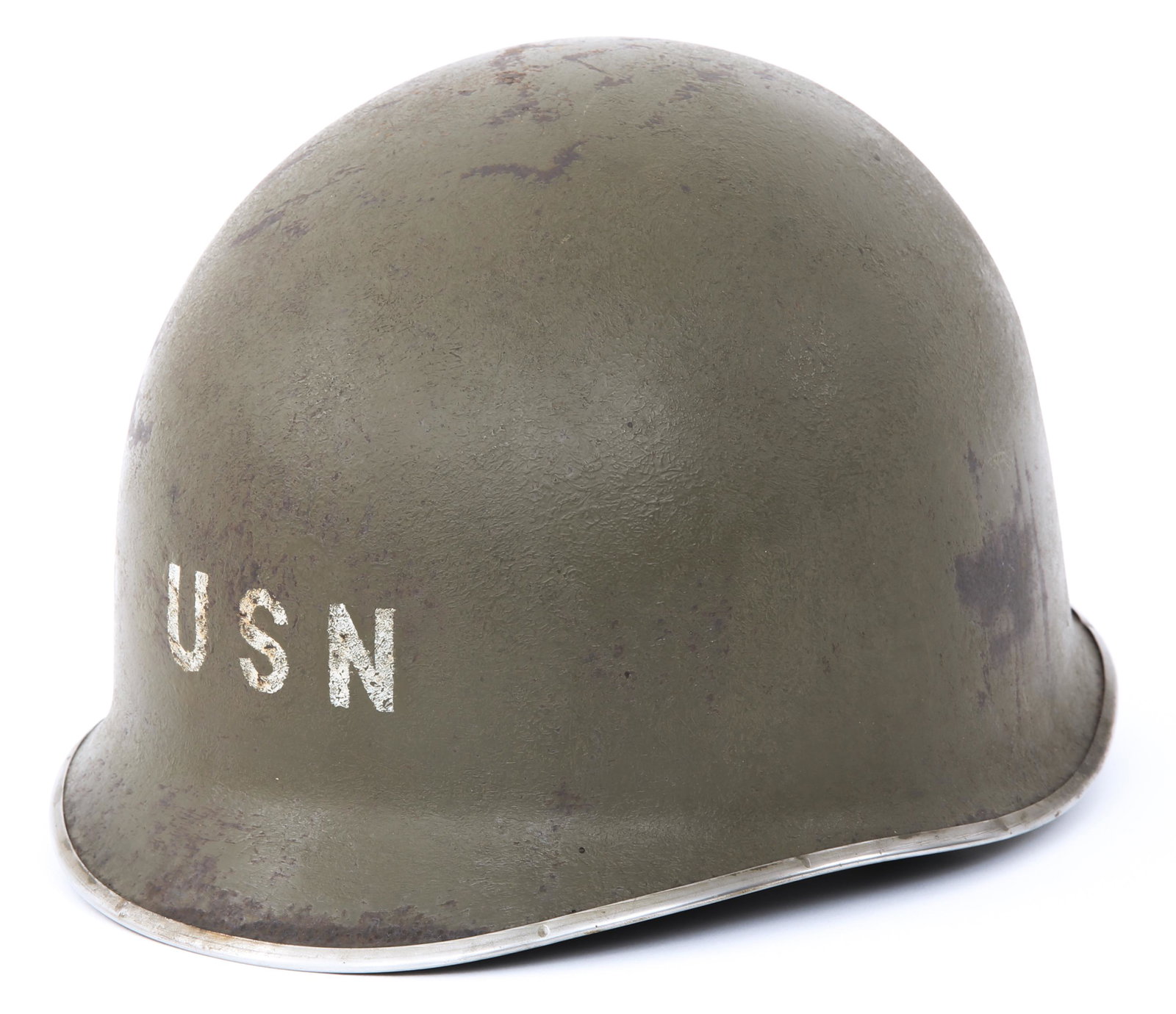 USN MARKED M1 COMBAT HELMET SHELL: USN MARKED M1 COMBAT HELMET SHELL Korean War - Early Vietnam, US Navy painted M1combat helmet shell. Rear seam. Inside painted over, as a result any marks are not visible. White stenciled USN insignia