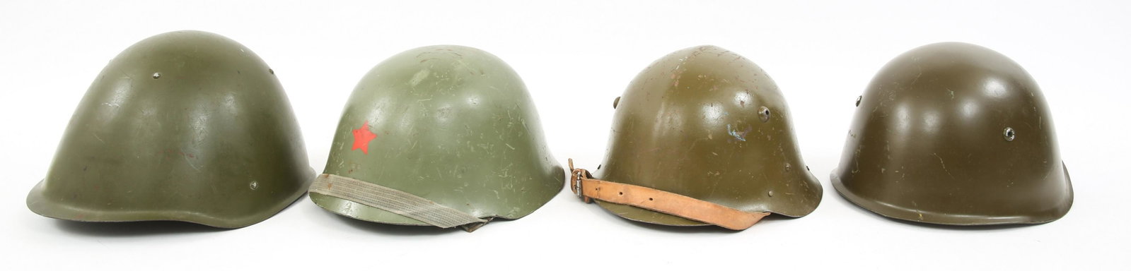 RUSSIAN BULGARIAN & YUGO MILITARY HELMETS LOT OF 4: RUSSIAN BULGARIAN & YUGO MILITARY HELMETS LOT OF 4 Lot of 4 world military helmets. (1) Bulgarian Model 36 helmet. (1) Yugoslavian Model 1959, frontal red star decal. (1) Bulgarian Model 1951. (1) Rus