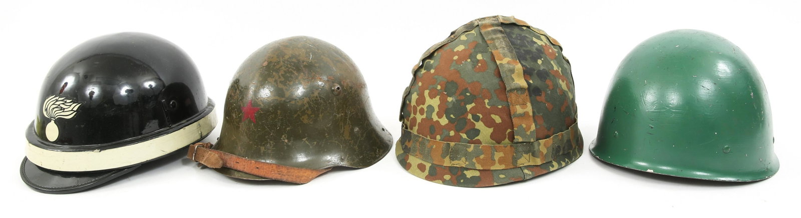 GERMAN & WORLD MILITARY HELMETS LOT OF 4: GERMAN & WORLD MILITARY HELMETS LOT OF 4 Lot of 4 world military helmets. (1) Swedish M37/65 bright green painted shell. (1) German M85 helmet with camo cover. (1) Bulgarian M36 with frontal red star 