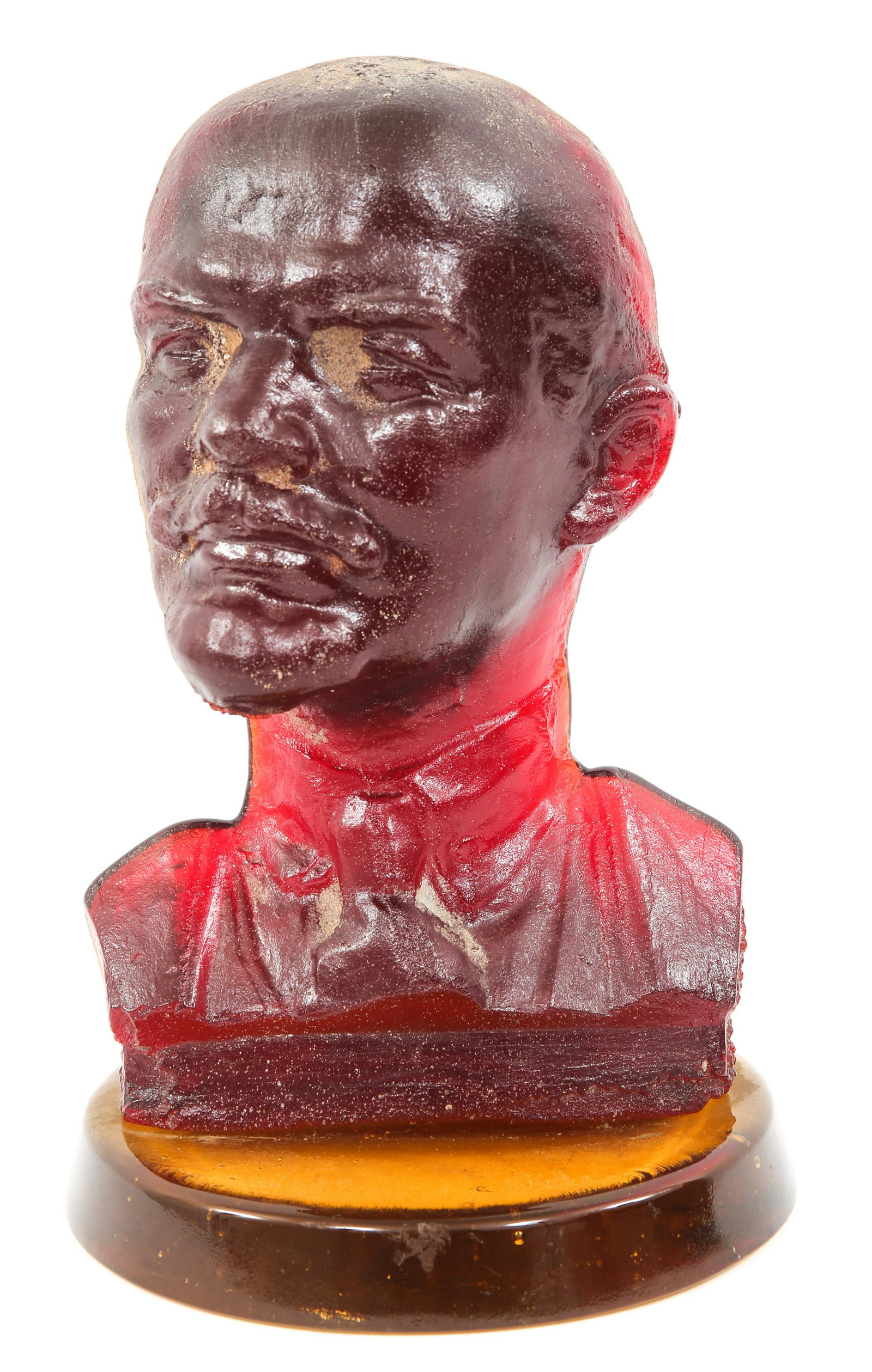 SOVIET UNION RED GLASS STATUE OF LENIN: SOVIET UNION RED GLASS STATUE OF LENIN Red Glass cast bust of Vladimir Lenin on a cast yellow glass base. Size: 10.5" x 7"