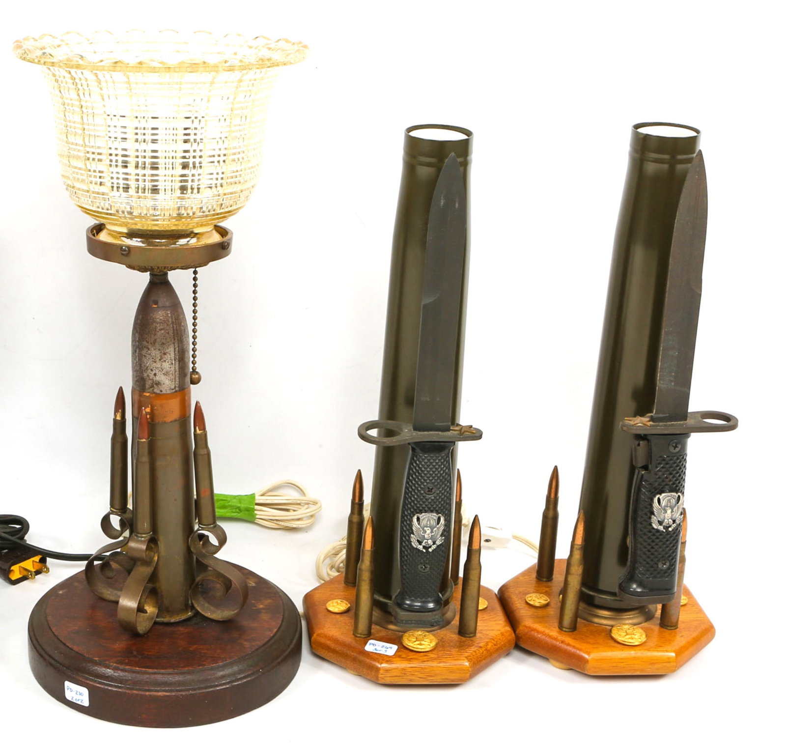 WWII - VIETNAM WAR TRENCH ART LAMP LOT OF 3: WWII - VIETNAM WAR TRENCH ART LAMP LOT OF 3 One glass topped bullet lamp and pair of matching bayonet lamps. Size: 14 - 18"