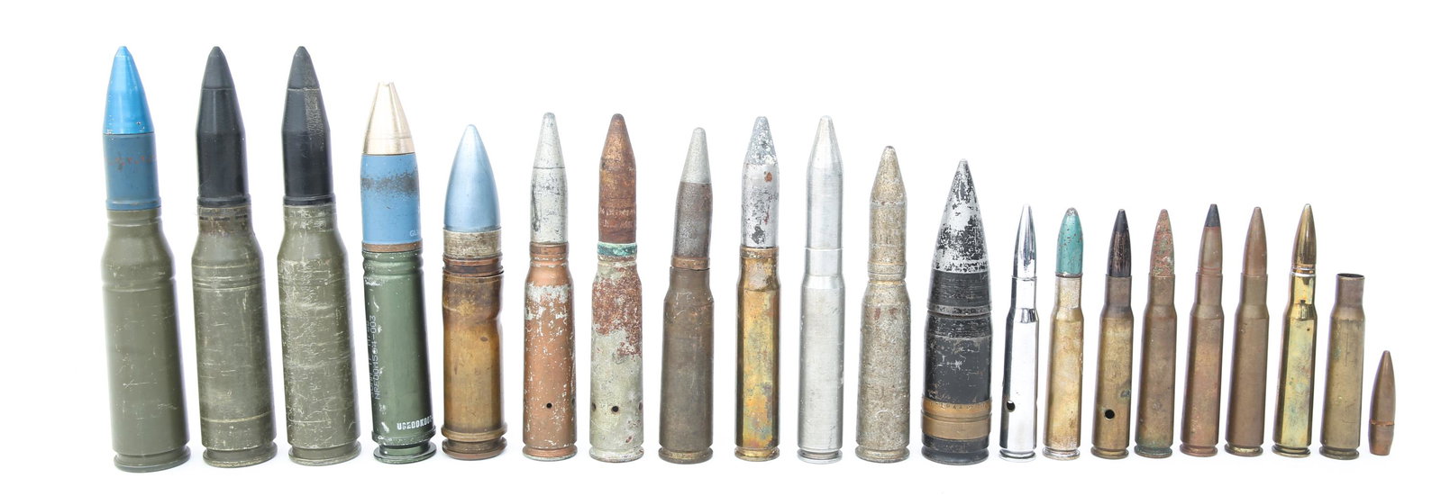 WWII TO VIETNAM WAR US & UK ORDNANCE LOT: WWII TO VIETNAM WAR US & UK ORDNANCE LOT WWII to Vietnam War era US & UK mixed ordnance lot. Inert and training ordnance. One spent shell head stamped "S L 43". 30mm Training XM369 dated 1967. 20mm MK