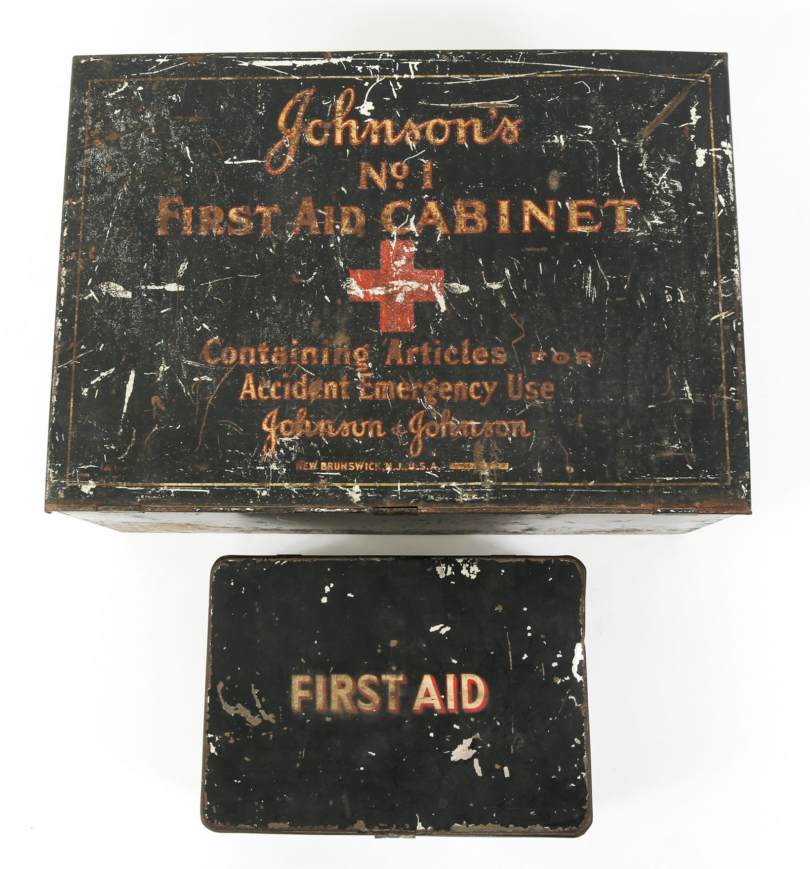 JOHNSON & JOHNSON NO. 1 FIRST AID KIT CABINET LOT: JOHNSON & JOHNSON NO. 1 FIRST AID KIT CABINET LOT Johnson & Johnson No. 1 First Aid Cabinet Wall Hanging Kit with original contents, measures 12" by 17". Includes smaller black painted first aid tin m