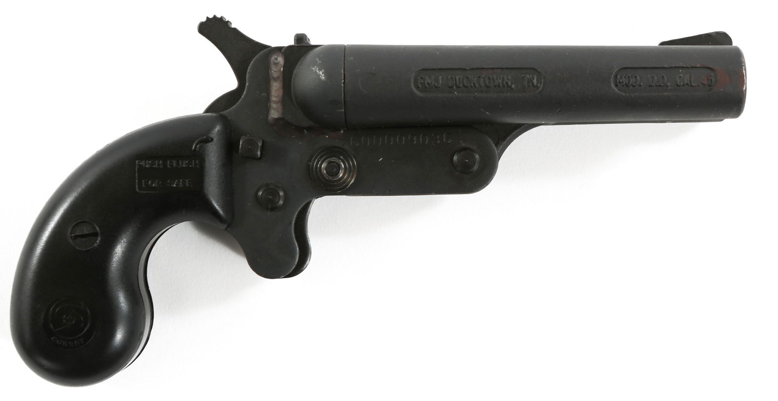 FMJ MODEL D.D. 45 CALIBER DERRINGER WITH BOX: FMJ MODEL D.D. 45 CALIBER DERRINGER WITH BOX FMJ Model D.D. .45 Long Colt & .410 GA With Box. The barrel is marked "FMJ Ducktown, TN Mod. D.D. Cal. 45" Parkerized finish, Cobray grips, and front ramp