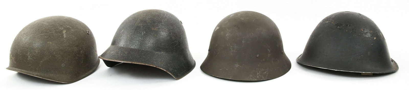 SWEDISH BRITISH & SWISS MILITARY HELMETS LOT OF 4: SWEDISH BRITISH & SWISS MILITARY HELMETS LOT OF 4 Swedish, British, and Swiss military helmets lot of 4. (1) Swedish M26 helmet. (1) Swiss M18/43 black painted shell. (1) Swiss M71 Combat green painte