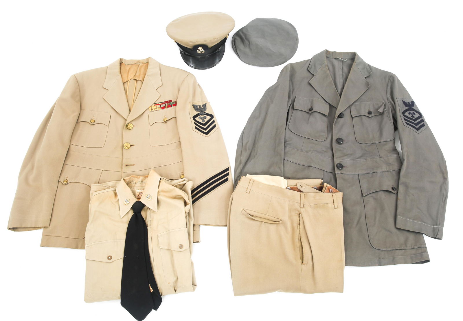 WWII US NAVY CPO KHAKI SUMMER & GRAY UNIFORM LOT: WWII US NAVY CPO KHAKI SUMMER & GRAY UNIFORM LOT 1- WWII US Navy Machinist's Mate Chief Petty Officer khaki summer uniform, tunic with bullion rank patch, custom embroidered ribbon bar, shirt with col