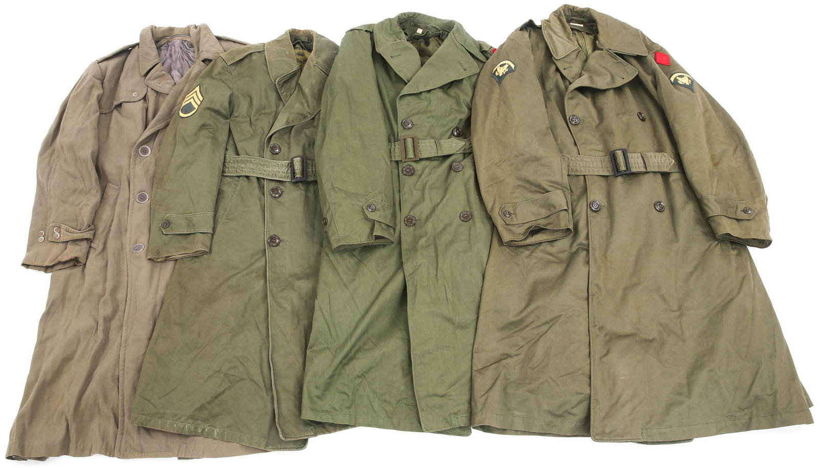 POST WWII & KOREAN WAR US ARMY OVERCOATS LOT OF 4: POST WWII & KOREAN WAR US ARMY OVERCOATS LOT OF 4 Post WWII & Korean War era US Army Overcoats or Trench Coats. Lot of 4. Tags marked O.D. - 107. Tags are dated 1946, 1954 and more. Three of the coats