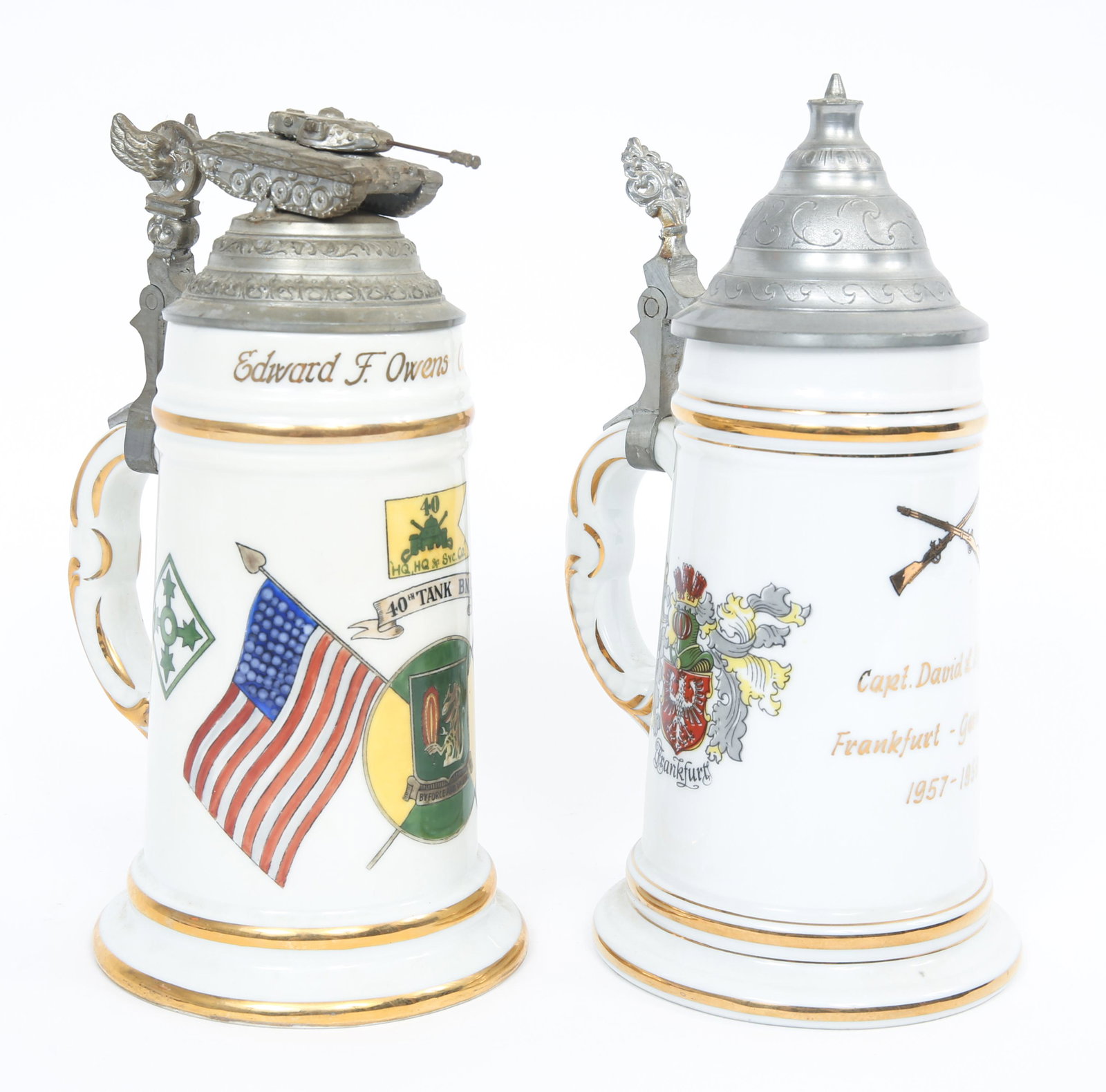 COLD WAR US ARMY WEST GERMAN BEER STEINS LOT OF 2: COLD WAR US ARMY WEST GERMAN BEER STEINS LOT OF 2 Cold War era US Military Armored Divisions West German Porcelain Beer Steins lot of 2. (1) Lid cover decorated with Tank. Marked "Edward F. Owens Capt