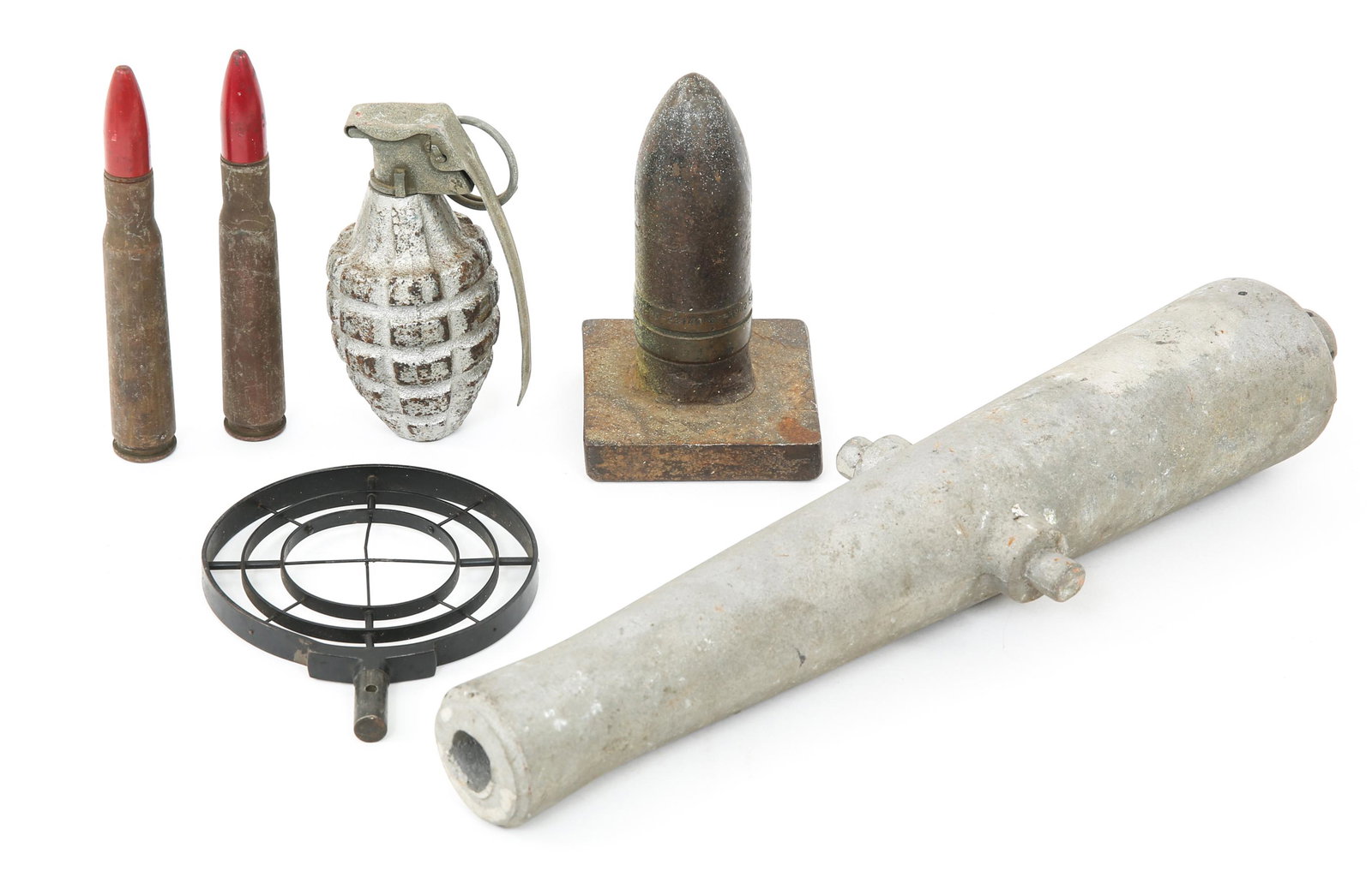 WWII TO COLD WAR ERA TRENCH ART & ORDNANCE LOT: WWII TO COLD WAR ERA TRENCH ART & ORDNANCE LOT WWII to Cold War era Trench Art & Ordnance lot. Desktop trench art projectile marked "37mm 1942" affixed to square base. Die cast display cannon barrel. 