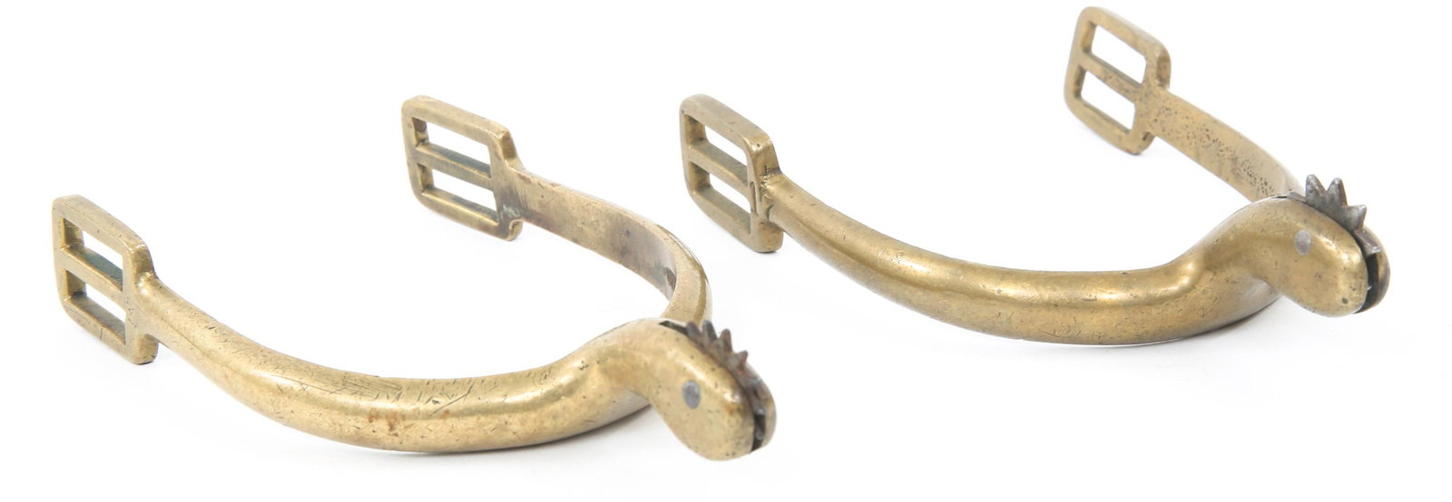 BRASS RIDING SPURS: BRASS RIDING SPURS Pair of Riding Spurs. Brass construction. Steel rotating spur. Unmarked. Measuring 3" wide by 5.5" long.