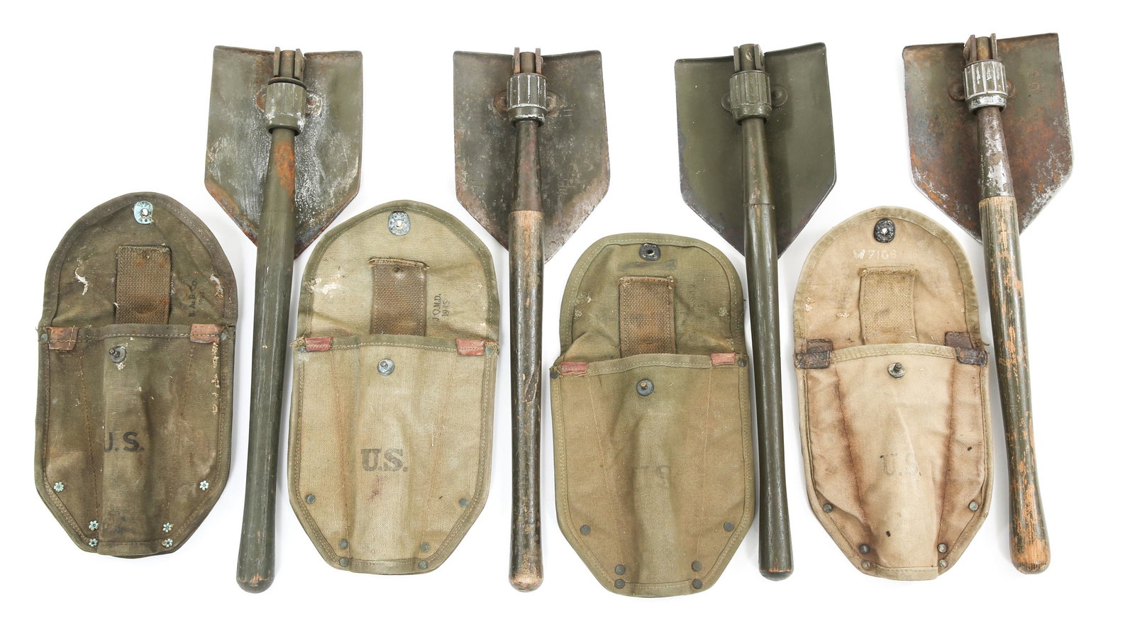 WWII US ARMY M43 ENTRENCHING TOOL SHOVEL LOT OF 4: WWII US ARMY M43 ENTRENCHING TOOL SHOVEL LOT OF 4 (1) M43 shovel stamped "US. AF&H Co. 1943" with 1st pattern OD3 carrier dated 43. (3) M43 folding shovel stamped "US. Ames" dated 1944 and 1945, 2nd p
