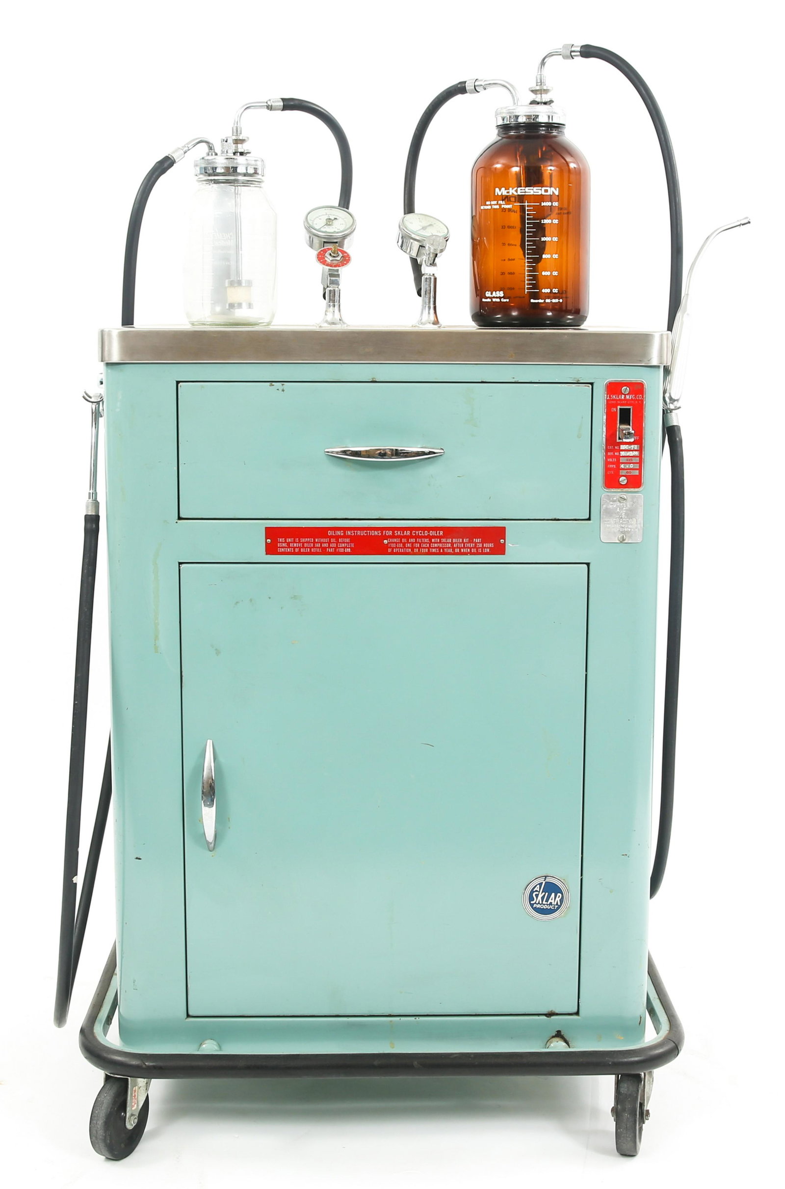 KOREAN WAR US ARMY SUCTION PRESSURE APPARATUS: KOREAN WAR US ARMY SUCTION PRESSURE APPARATUS US Army Korean War era US Army Surgical Suction & Pressure Double Compressor Mobile Apparatus. NSN No. 6515-00-375-3100. Specs are 110 Volt, 60Hz A.C. Mad