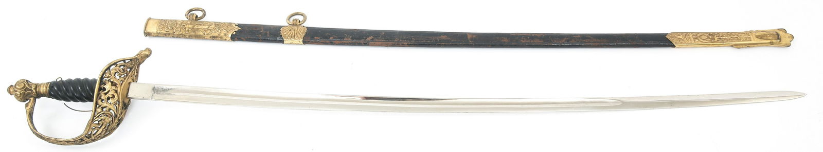 AUSTRIAN NAVAL SWORD & DSG MARKED SCABBARD: AUSTRIAN NAVAL SWORD & DSG MARKED SCABBARD Austrian naval sword & DSG marked scabbard. Bright curved saber blade. Unmarked ricasso and spine. Ornate brass hilt. Carved black grip. Black leather scabba