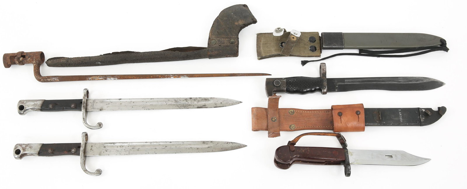19TH & 20TH C. RIFLE BAYONETS LOT OF 5: 19TH & 20TH C. RIFLE BAYONETS LOT OF 5 19th & 20th Century Rifle Bayonets Lot of 5. (1) US Socket Bayonet with leather sheath. 18" blade, total length 21". (1) AKM Bayonet with matching serial numbers