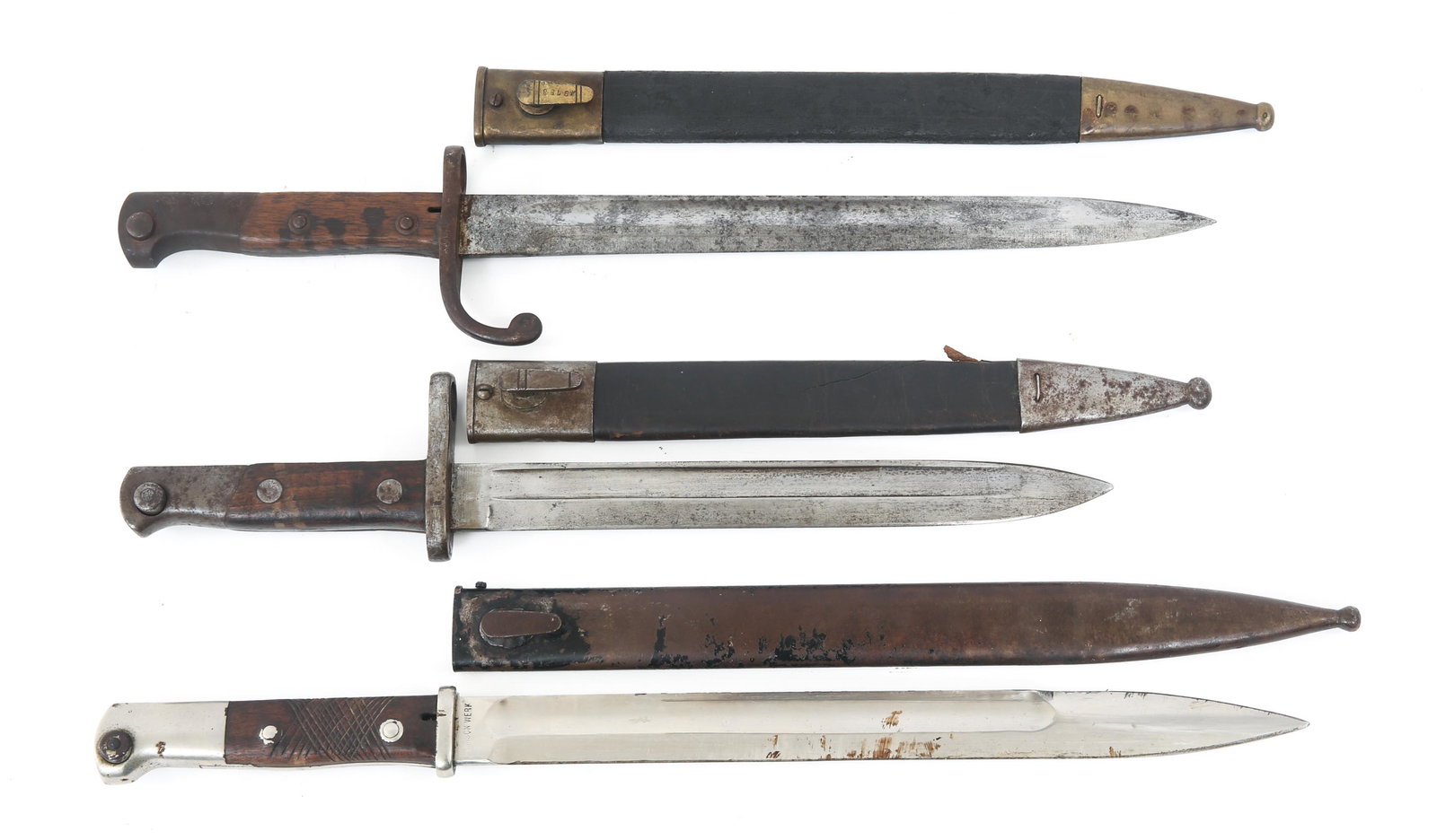 ARGENTINA & GERMANY MILITARY BAYONETS LOT OF 3: ARGENTINA & GERMANY MILITARY BAYONETS LOT OF 3 Argentinean & German Military Bayonets lot of 3. (1) Argentinean M1871/84, fullered blade. Wood grips. 10" blade length, 15" total length. Leather scabba