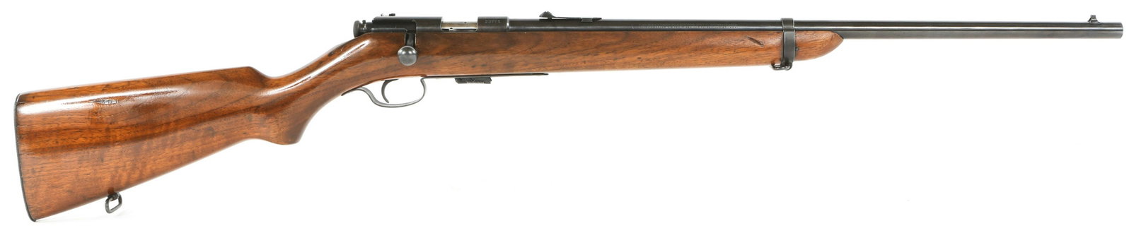 WINCHESTER MODEL 57 BOLT ACTION .22 CALIBER RIFLE: WINCHESTER MODEL 57 BOLT ACTION .22 CALIBER RIFLE Winchester model 57 bolt action .22 caliber rifle. Barrel stamped "Model 57 Winchester". Wooden stock. Five round magazine. Fixed front and rear iron 