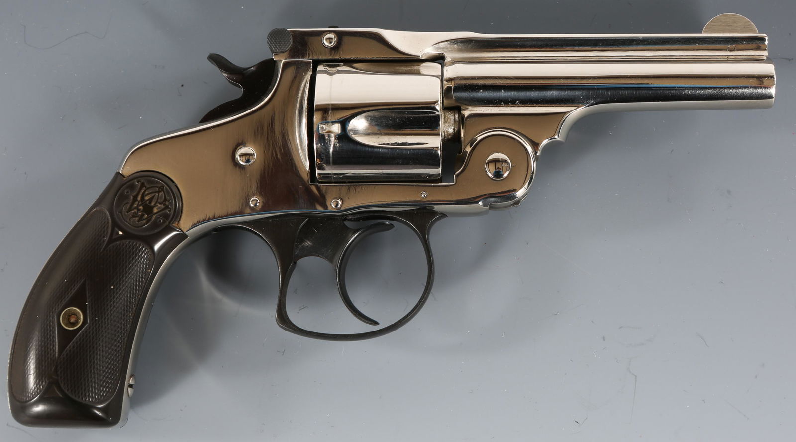 SMITH & WESSON .38 CALIBER 3rd MODEL REVOLVER: SMITH & WESSON .38 CALIBER 3rd MODEL REVOLVER Smith & Wesson model 3 double action.38 caliber revolver. Barrel stamped with Smith & Wesson trademark and patents. Composite grips. Fixed front blade sig