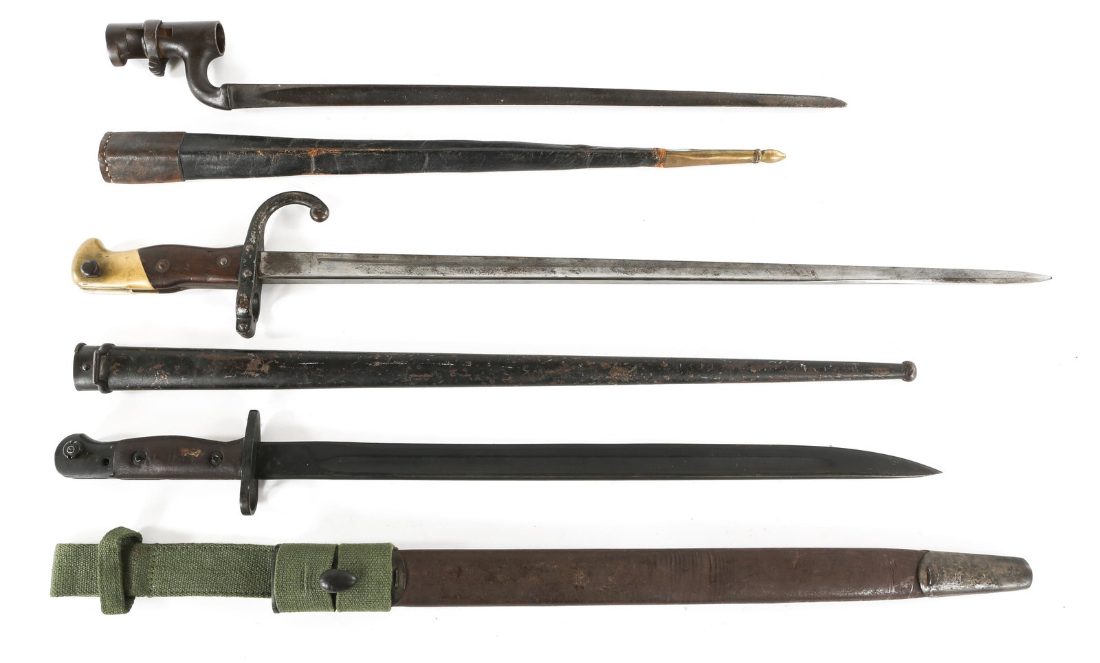 WWI ERA MILITARY RIFLE BAYONETS LOT OF 3: WWI ERA MILITARY RIFLE BAYONETS LOT OF 3 Lot of three mixed rifle bayonets. British M1907 with broad arrow stamps and 1942 date on blade, handle stamped "SLAZ 44". French Gras model 1874 bayonet. Blad