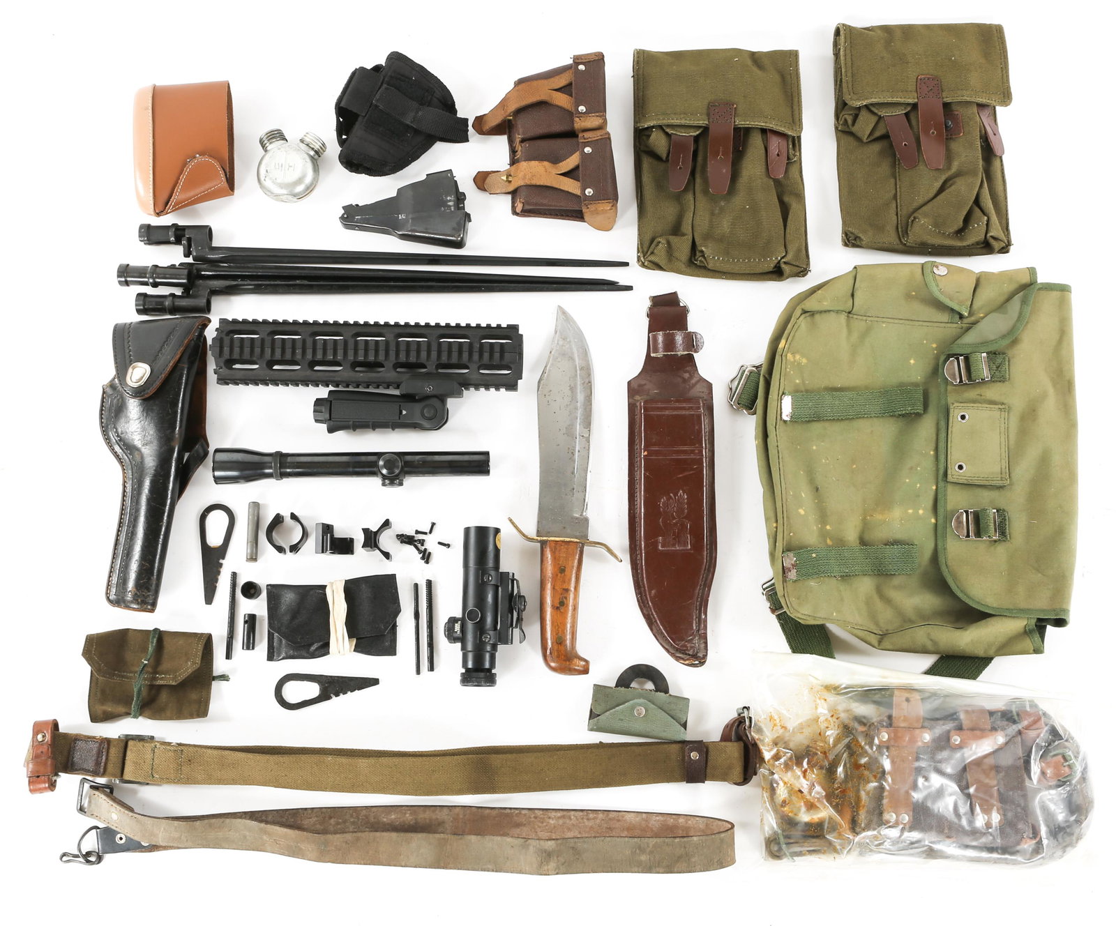 FIREARM ACCESSORIES - HOLSTERS, BAYONETS, PARTS: FIREARM ACCESSORIES - HOLSTERS, BAYONETS, PARTS Mosin bayonets, pouches , and accessories, Two holsters. Scopes. AR fore end. Butt pad. Pakistani Bowie knife. Provenance - George Hass (US Army Veteran