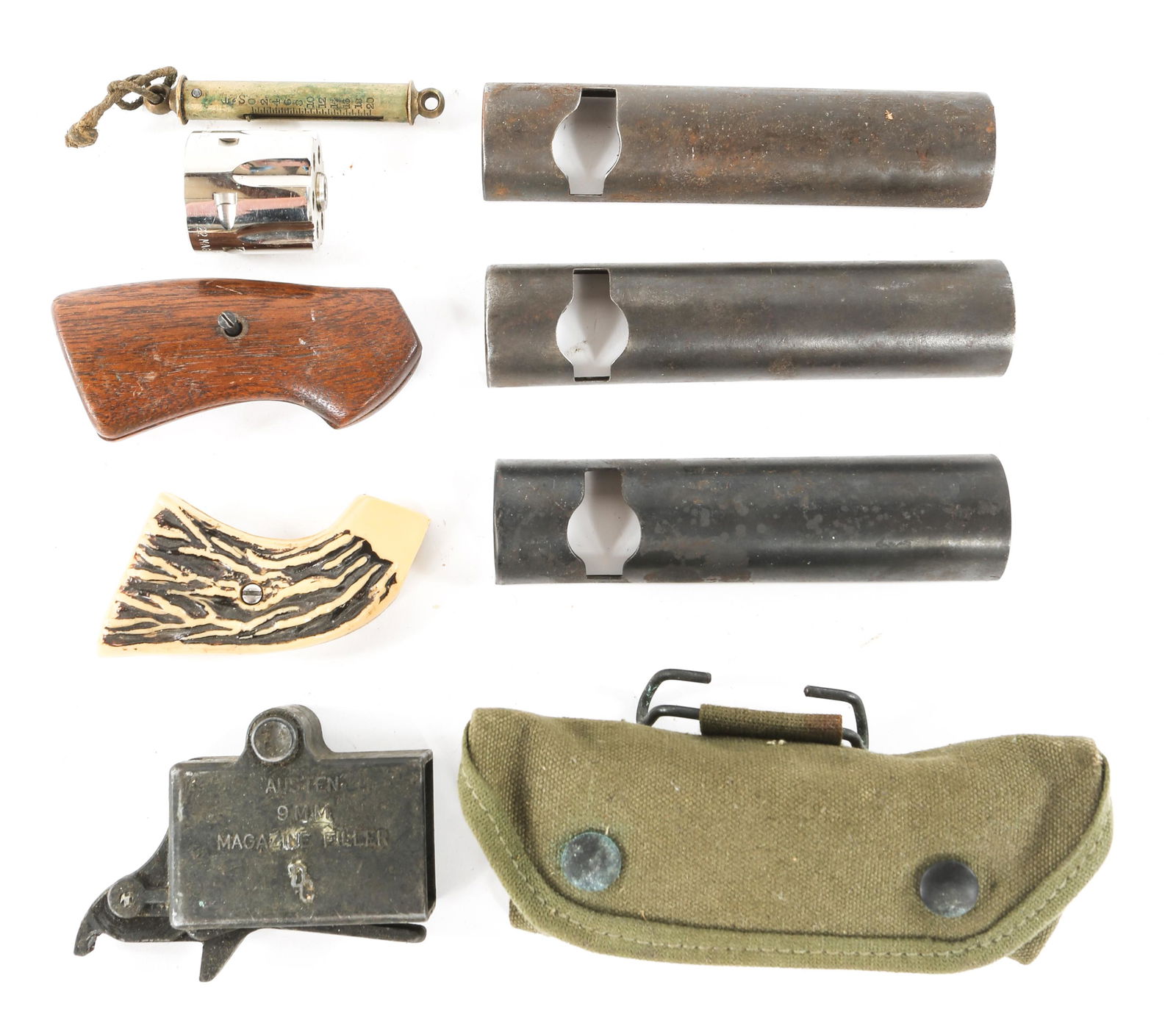 FIREARM ACCESSORIES - GRIPS, SIGHTS, DUST COVERS: FIREARM ACCESSORIES - GRIPS, SIGHTS, DUST COVERS Lot of Firearm Accessories. Three Arisaka dust covers. Austen 9mm Loader. One walnut grip, one faux stag grip. M-15 grenade launcher sights. Six shot .