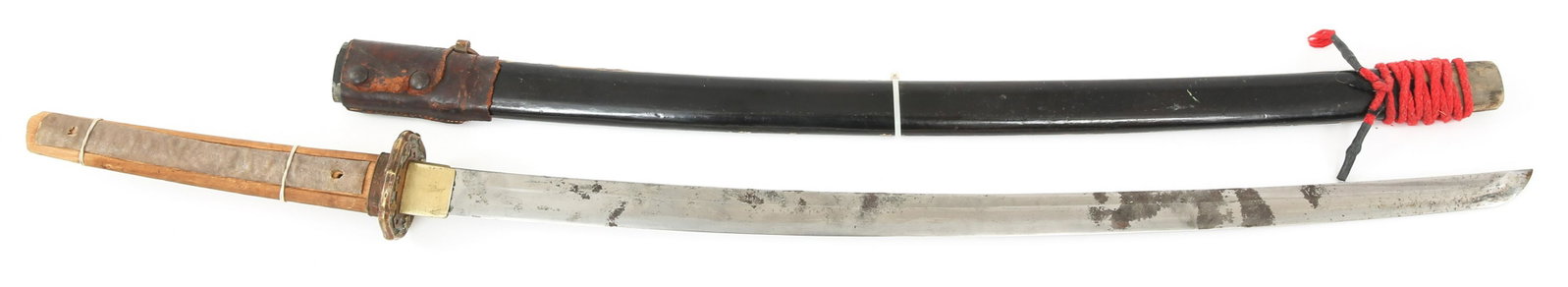 JAPANESE SAMURAI KATANA SWORD & SAYA SIGNED TANG: JAPANESE SAMURAI KATANA SWORD & SAYA SIGNED TANG Japanese Samurai Katana Sword & Saya. Signed Tang. Visible temper line to blade's edge. Brass Habaki collar. Floral decorations to brass Tsuba crossgua