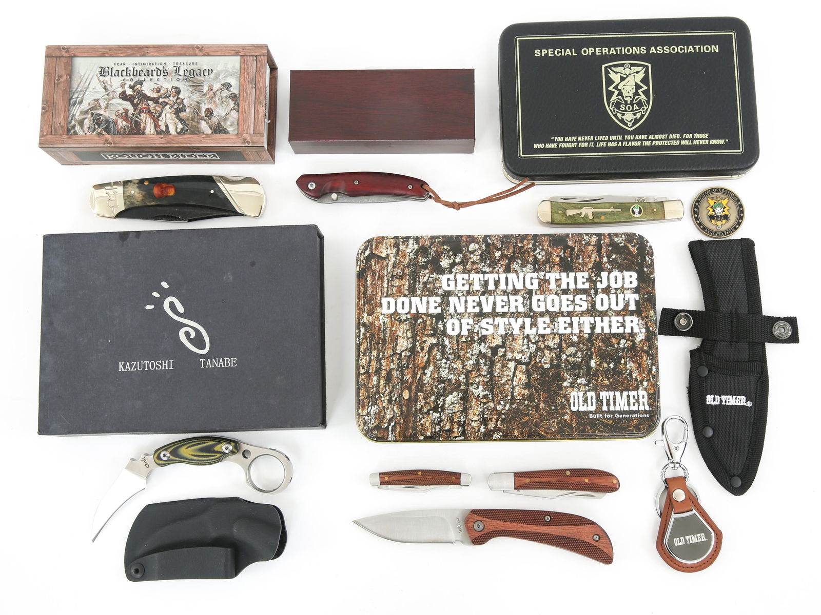 SOA OLD TIMER ROUGH RIDER & KAZUTOSHI KNIVES LOT: SOA OLD TIMER ROUGH RIDER & KAZUTOSHI KNIVES LOT Special Operations Association (SOA), Old Timer, Rough Rider & Kazutoshi Tanabe Knives lot of 7. (1) SOA trapper knife by United Cutlery and coin set.