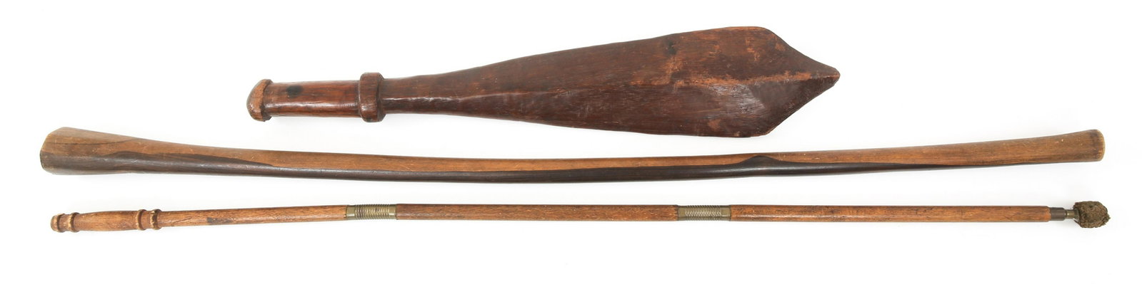 AFRICAN WAR CLUBS & SHOTGUN CLEANING ROD LOT: AFRICAN WAR CLUBS & SHOTGUN CLEANING ROD LOT African War Clubs & Shotgun Cleaning Rod. Lot of 3. One long club measuring 37" in length. One smaller stout club with a defined handle measuring 21" in le