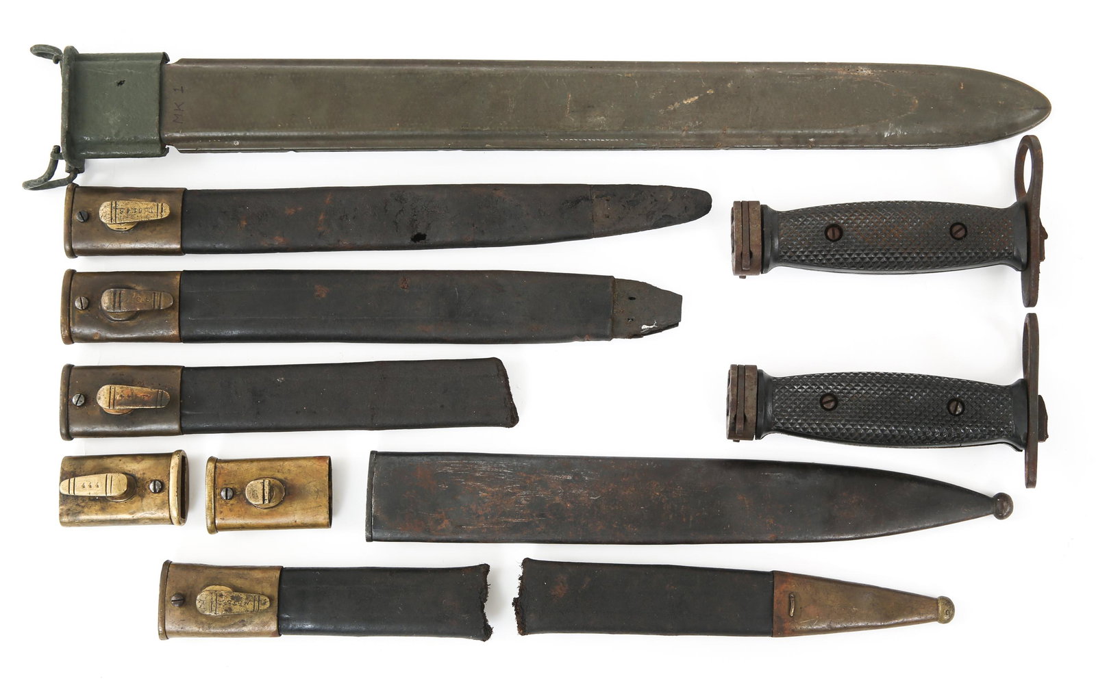 US & WORLD MILITARY BAYONET SCABBARD & HANDLES LOT: US & WORLD MILITARY BAYONET SCABBARD & HANDLES LOT US & World Military Bayonet Scabbards and Handles Lot. Two US M7 bayonet handles, marked crossguards. Unmarked US MK1 Scabbard. One steel scabbard. 7