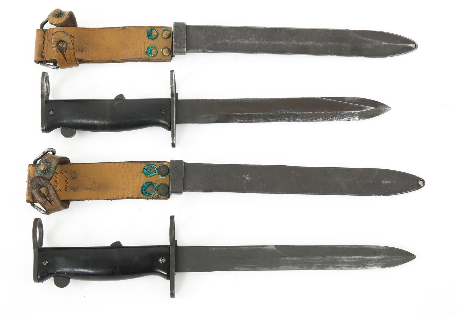 FRENCH FAMAS & M1956 RIFLE BAYONETS LOT OF 2: FRENCH FAMAS & M1956 RIFLE BAYONETS LOT OF 2 French Famas & M1956 Rifle Bayonets lot of 2. (1) FAMAS bayonet. Crossguard marked "MAT F". Blade measures 8" and 12.75" in overall length. (1) M1956 bayon