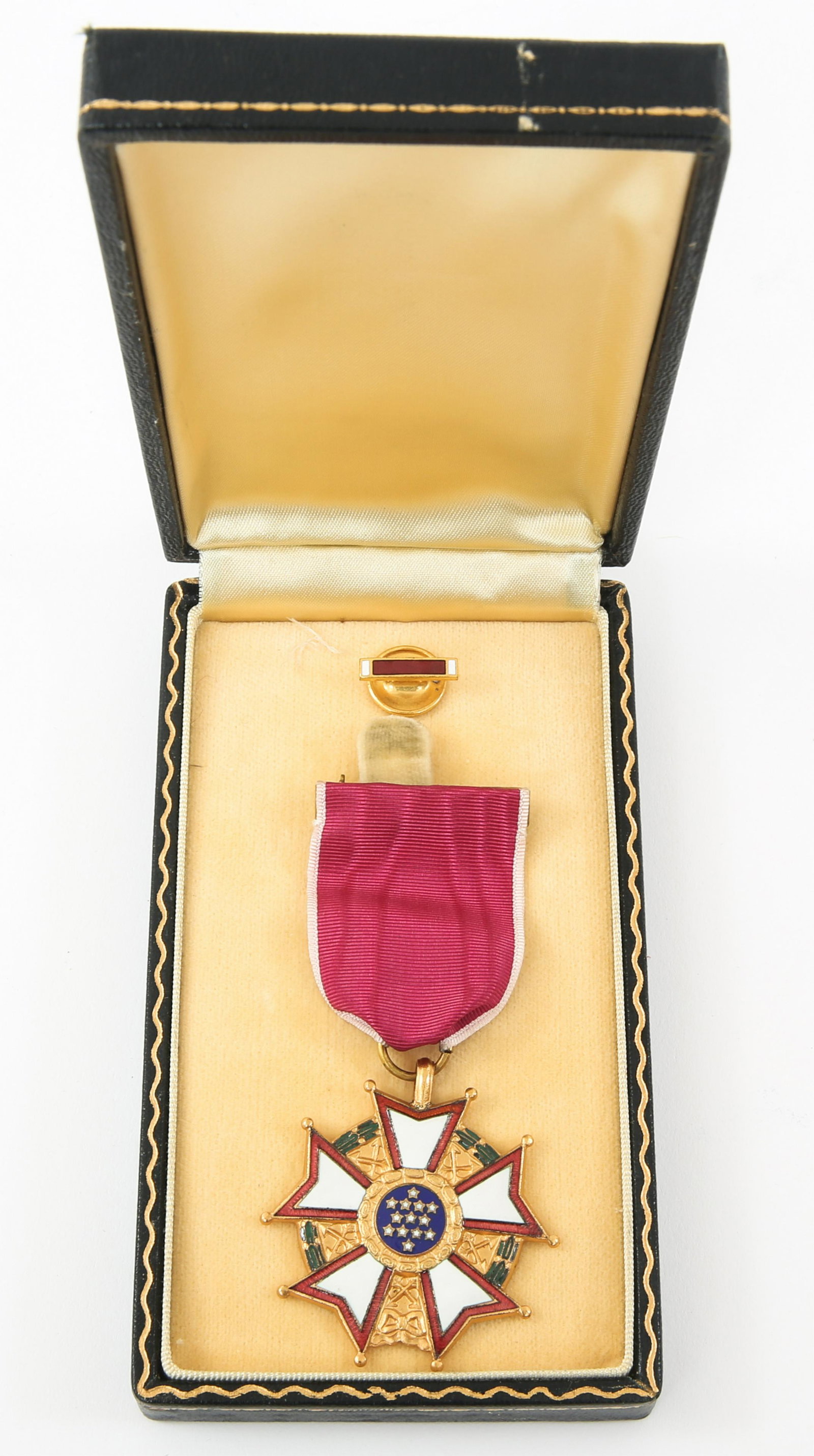 WWII US NAVY - USMC LEGION OF MERIT WITH CASE: WWII US NAVY - USMC LEGION OF MERIT WITH CASE WWII US Navy - USMC Legion of Merit medal with Short Coffin case. "Legionnaire class" with full wrap brooch and lapel pin. Case size 3.1/4" x 5.5/8".