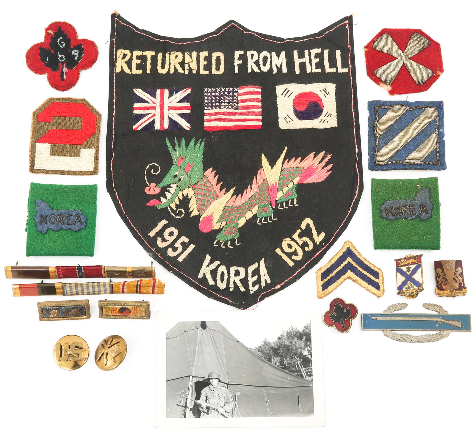 WWII TO KOREAN WAR US ARMY SERVICE GROUPING: WWII TO KOREAN WAR US ARMY SERVICE GROUPING WWII to Korean War US Army Service Grouping. Large Theater made Shield Tour patch that reads "RETURNED FROM HELL 1951 KOREA 1952" with an embroidered dragon