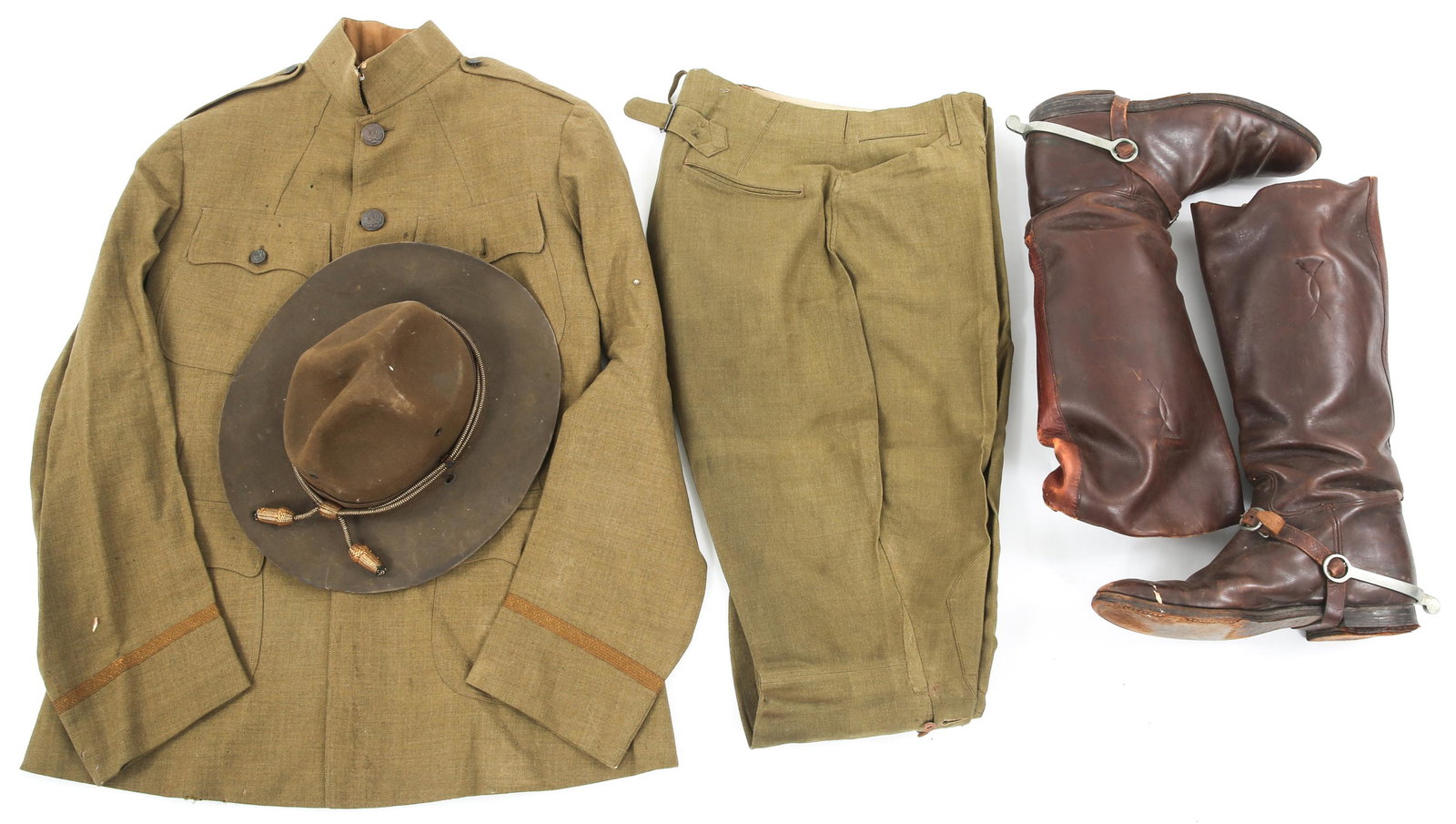 WWI US ARMY OFFICER NAMED UNIFORM WITH HAT & BOOTS: WWI US ARMY OFFICER NAMED UNIFORM WITH HAT & BOOTS WWI US Army Officer named uniform. Including 4 pockets wool tunic, named tailor tag, dated 1918. (1) Wool breeches 28 x 23. (1) Officer brown leather