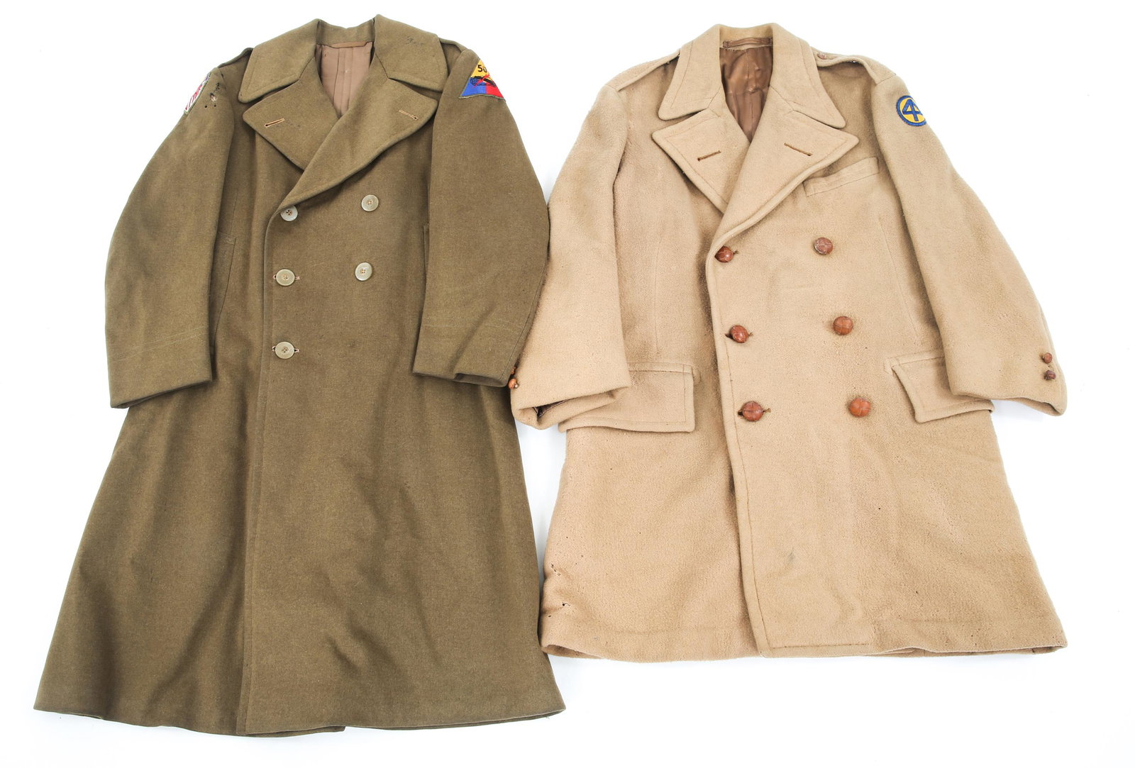 WWII US ARMY OFFICER WINTER OVERCOAT LOT OF 2: WWII US ARMY OFFICER WINTER OVERCOAT LOT OF 2 WWII US Army officer overcoat, lot of 2. (1) Fine quality heavy wool fabric overcoat with 50th Armored & Strategic Air Force Europe patches, tailor tag, d