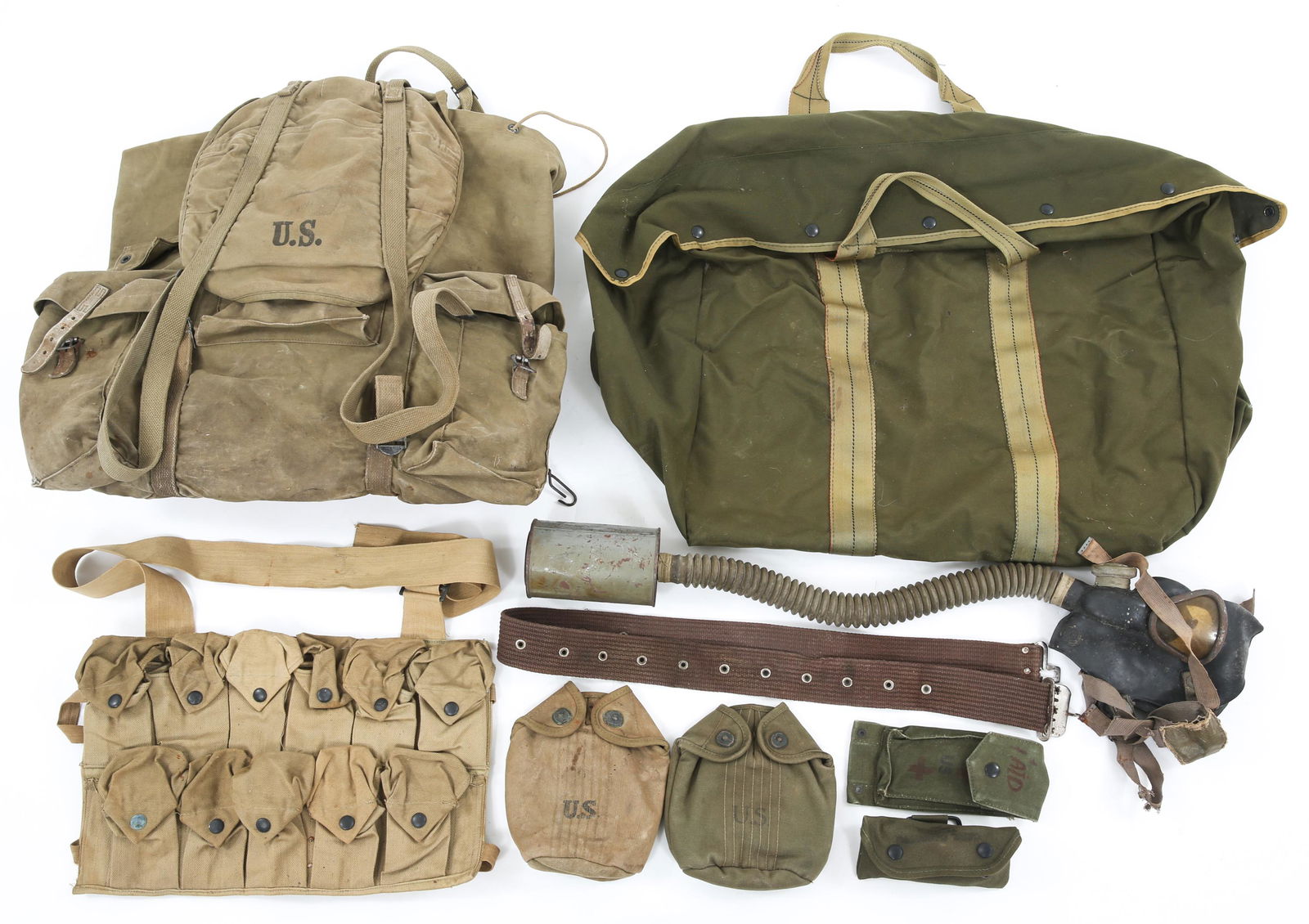 WWII US MOUNTAIN TROOPS RUCKSACK & FIELD GEAR LOT: WWII US MOUNTAIN TROOPS RUCKSACK & FIELD GEAR LOT WWII US Army Mountain Troops Rucksack & Field Gear lot. (1) Model 1942 Mountain Troops Rucksack. (1) WWI grenade chest pouch.(1) OD3 canteen cover dat