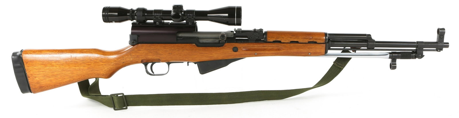 NORINCO MODEL SKS 7.62X39 SEMI AUTO RIFLE: NORINCO MODEL SKS 7.62X39 SEMI AUTO RIFLE Norinco model SKS 7.62x39 semi-automatic rifle. Receiver is stamped "SKS 7.62x39 Made In China". Matching serial numbers on bolt, trigger guard, and underside