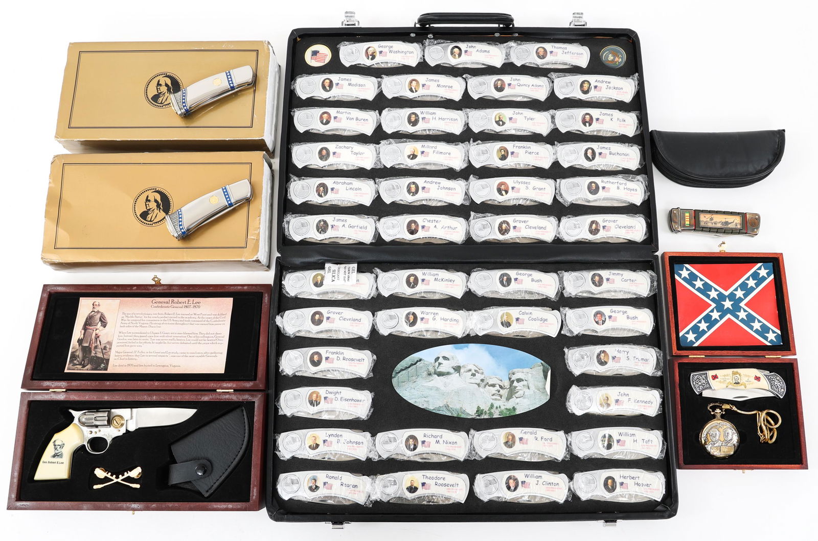 COMMEMORATIVE FOLDING KNIVES LOT OF 48: COMMEMORATIVE FOLDING KNIVES LOT OF 48 Lot of 48 Commemorative folding knives. (1) Set of 43 "President of The United States" commemorative folding knives in a suitcase. (1) General Lee Pistol-shaped