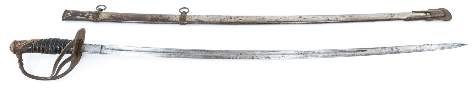 INDIAN WARS MODEL 1872 CAVALRY OFFICER SWORD: INDIAN WARS MODEL 1872 CAVALRY OFFICER SWORD Indian Wars US M1872 Cavalry Sword. Unmarked curved blade with fuller. Brass decorated hilt with wired leather covered grip. Steel scabbard with brass fitt