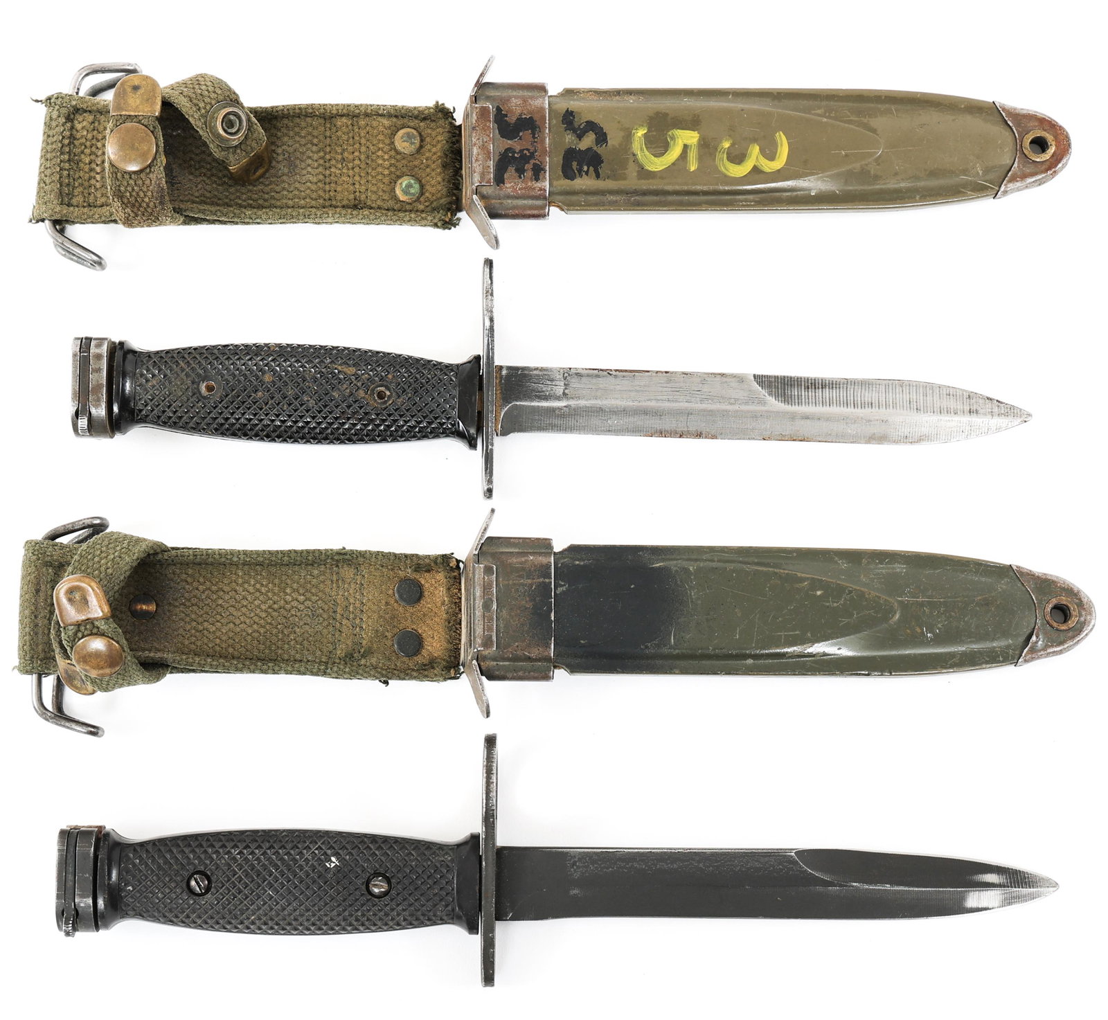 VIETNAM WAR US ARMY M7 BAYONET LOT OF 2: VIETNAM WAR US ARMY M7 BAYONET LOT OF 2 Lot of 2 US Army M7 Bayonets with scabbards. (1) Maker mark "US, M7, BOC" stamped under the cross guard. (1) Maker Mark "US, M7, Imperial" stamped under the cro