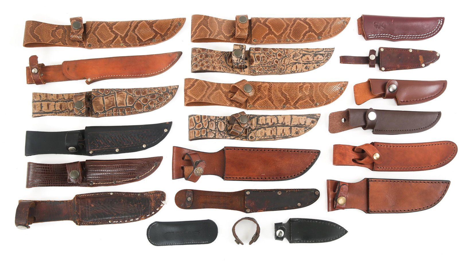 MODERN FIXED BLADE KNIFE SHEATHS LOT OF 20: MODERN FIXED BLADE KNIFE SHEATHS LOT OF 20 Modern Fixed Blade Knife Sheaths Lot of 20. Some are in snake skin and alligator hide patterns, brown and black leather. Lengths range from 5" to 11".