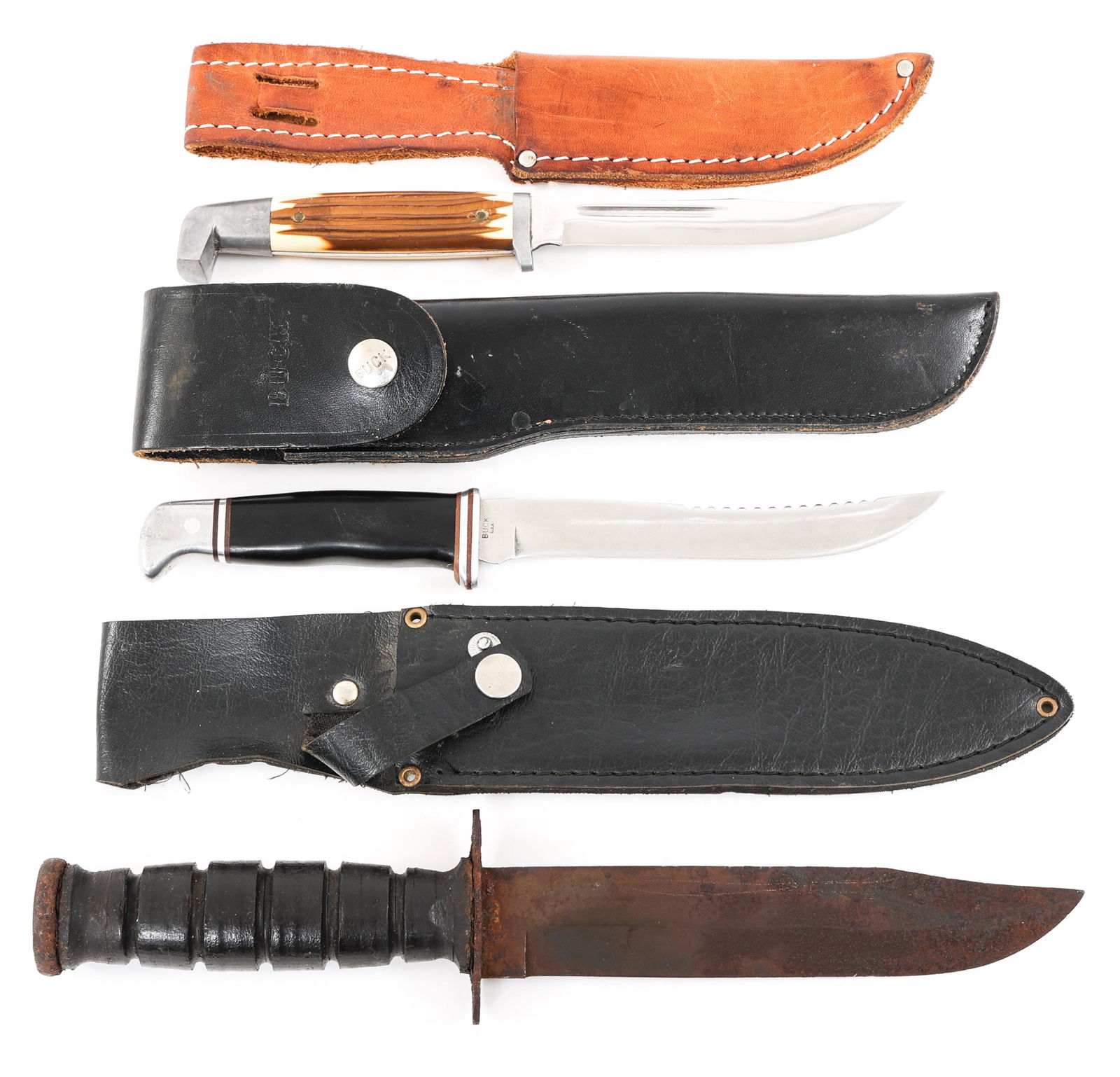 ONTARIO - CAMILLUS - BUCK KNIFE LOT OF 3: ONTARIO - CAMILLUS - BUCK KNIFE LOT OF 3 Lot of 3 knives. (1) US Camillus Mark II utility / fighting knife with commercial black leather sheath. Blade Length: 7". Total Length: 12". (1) Buck 100 serie