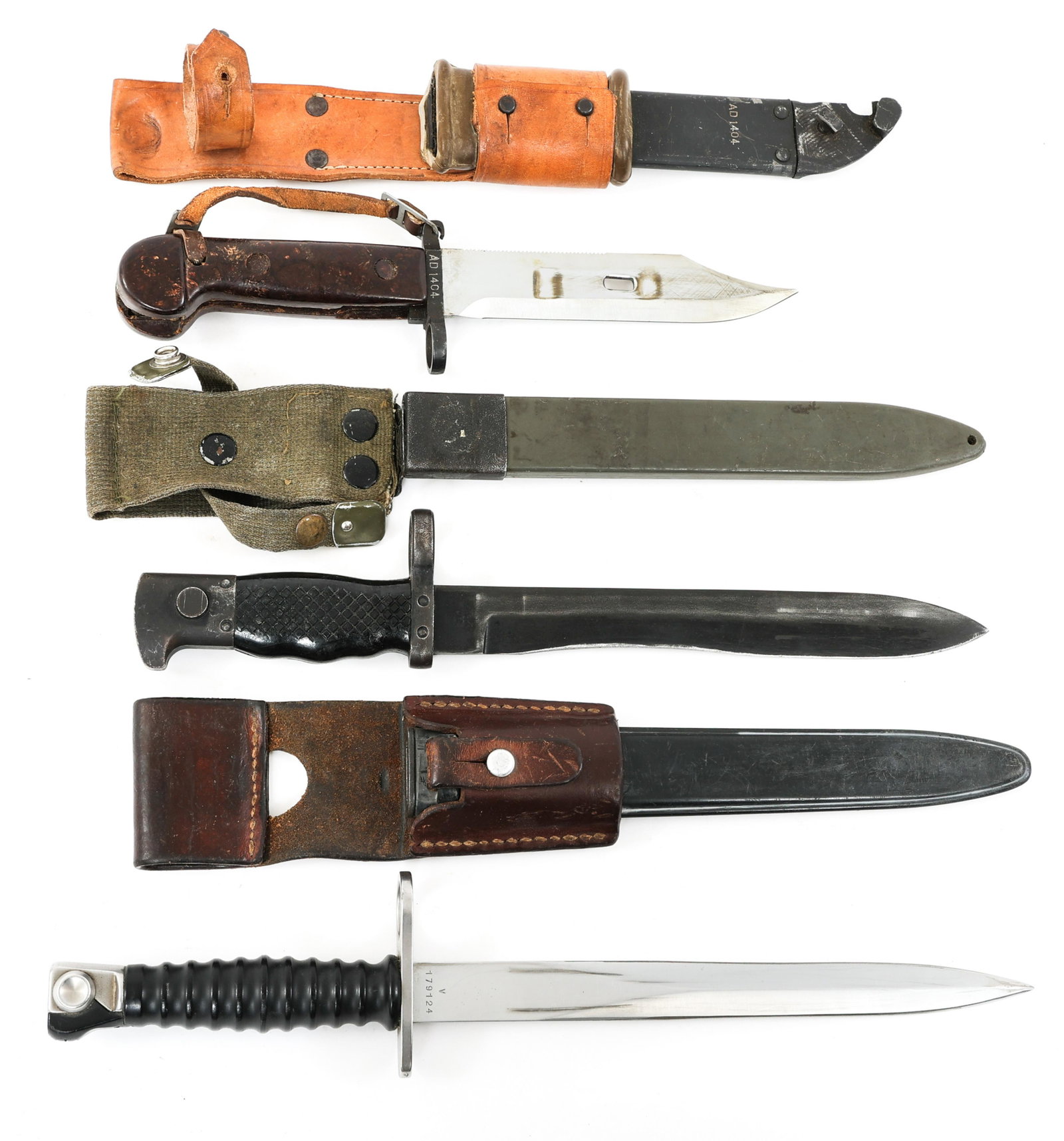 RUSSIAN - SWISS - SPANISH BAYONET LOT OF 3: RUSSIAN - SWISS - SPANISH BAYONET LOT OF 3 Lot of 3 Bayonets. (1) Russian AK47 bayonet with scabbard and leather frog. Matching serial number. Blade Length: 6". Total Length: 11". (1) Swiss Bayonet Mo