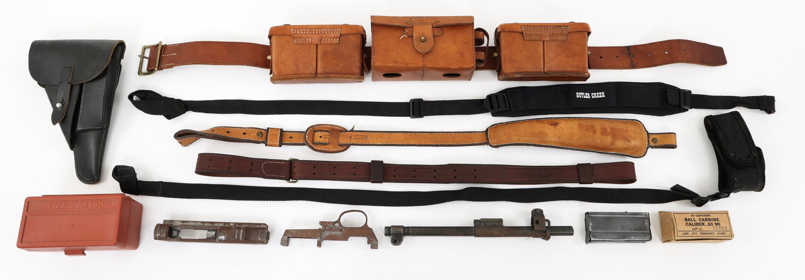 US M1 CARBINE PARTS - RIFLE SLINGS & POUCH: US M1 CARBINE PARTS - RIFLE SLINGS & POUCH Mixed lot of field gear, M1 Carbine parts and holster. (1) Unmarked light brown leather belt with 3 ammo pouches. (1) US M1 Carbine parts, upper receiver sta