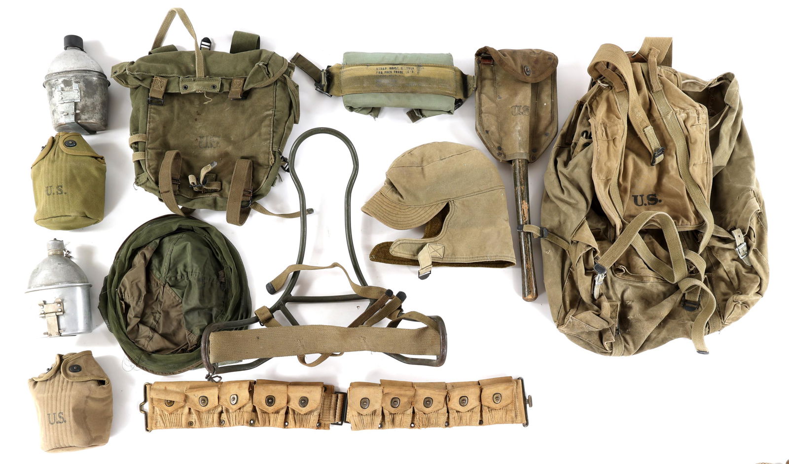 WWII US ARMY RUCKSACK - CANTEEN & FIELD GEAR LOT: WWII US ARMY RUCKSACK - CANTEEN & FIELD GEAR LOT WWII US Army field gear mixed lot. (1) Mountain Troops rucksack & metal frame. (1) cartridge belt. (1) E-Tool by Ames 1945, carrying pouch 44. (1) Army