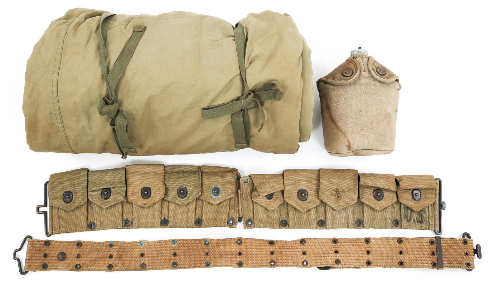 WWII US ARMY SLEEPING BAG & FIELD GEAR LOT: WWII US ARMY SLEEPING BAG & FIELD GEAR LOT WWII US Army field gear lot. (1) Sleeping bag. (1) cartridge belt. (1) Pistol Belt. (1) canteen.