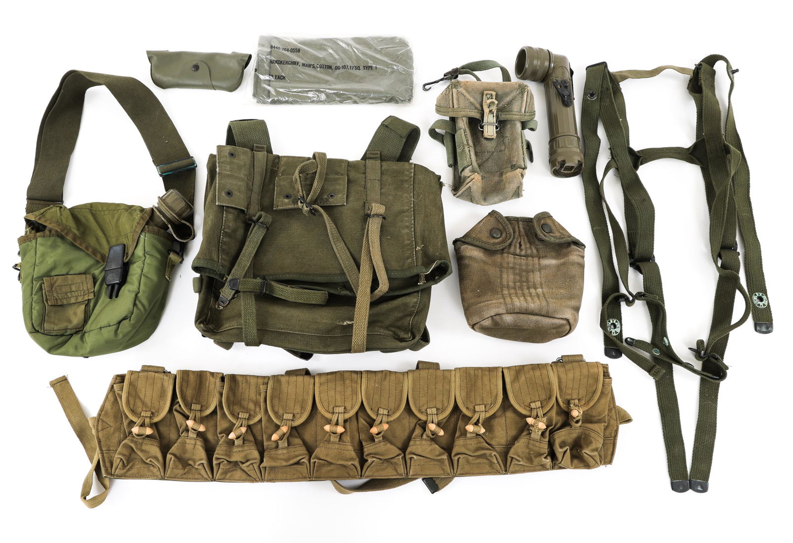 VIETNAM WAR US ARMY & USMC FIELD GEAR LOT: VIETNAM WAR US ARMY & USMC FIELD GEAR LOT Vietnam War era US Army & USMC field gear lot. (1) USMC M41 upper pack, dated 67. (1) 2 Qt canteen with nylon carrying pouch. dated 68. (1) MX-991/U Flashligh