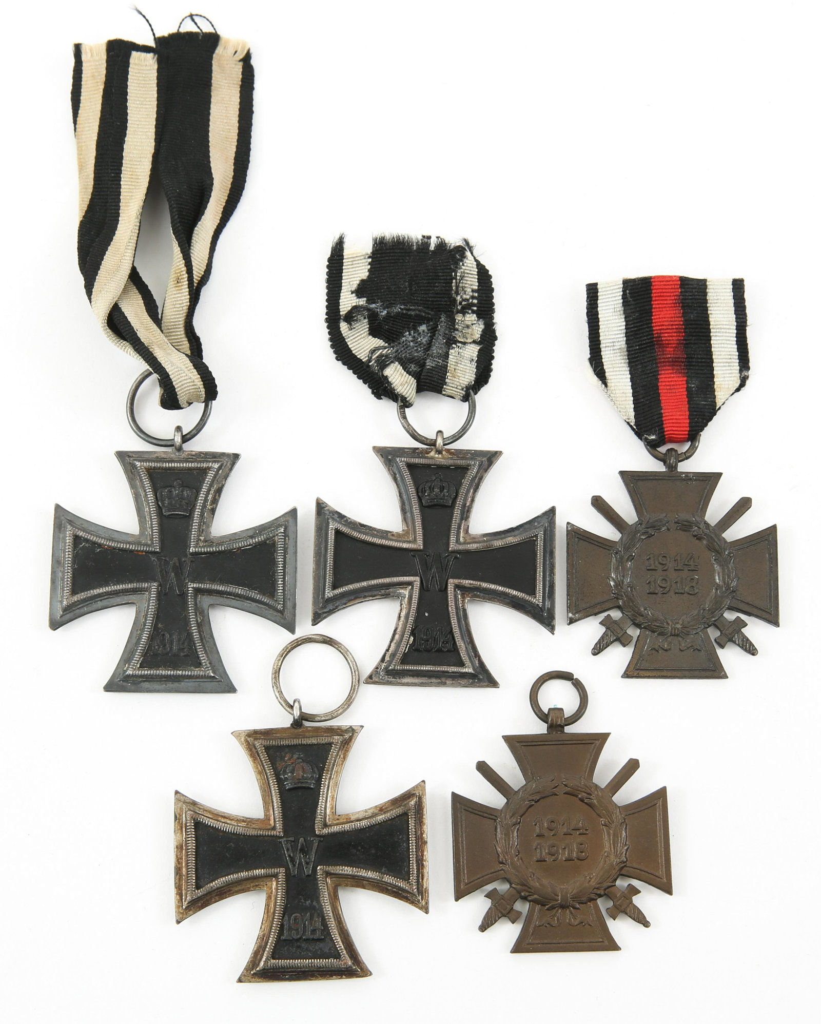 WWI IMPERIAL GERMAN IRON CROSS & MEDAL LOT: WWI IMPERIAL GERMAN IRON CROSS & MEDAL LOT Lot of 5 WWI Imperial German medals. (3) Imperial German Iron Cross Second Class Medals, all 3 with maker marks on the rings but hard to read. (2) Imperial G