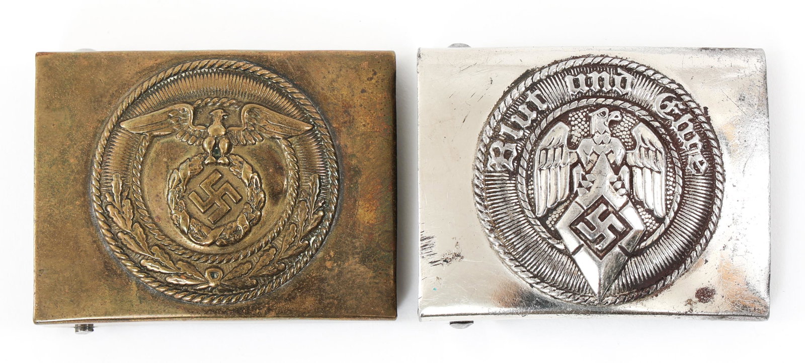 WWII GERMAN HITLER YOUTH & SA BELT BUCKLES LOT: WWII GERMAN HITLER YOUTH & SA BELT BUCKLES LOT Lot of 2 WWII German Hitler Youth Steel Based, maker marked Belt Buckle and Brass Based, Unmarked SA Belt Buckle. Size: 1.7/8" x 2.3/8"