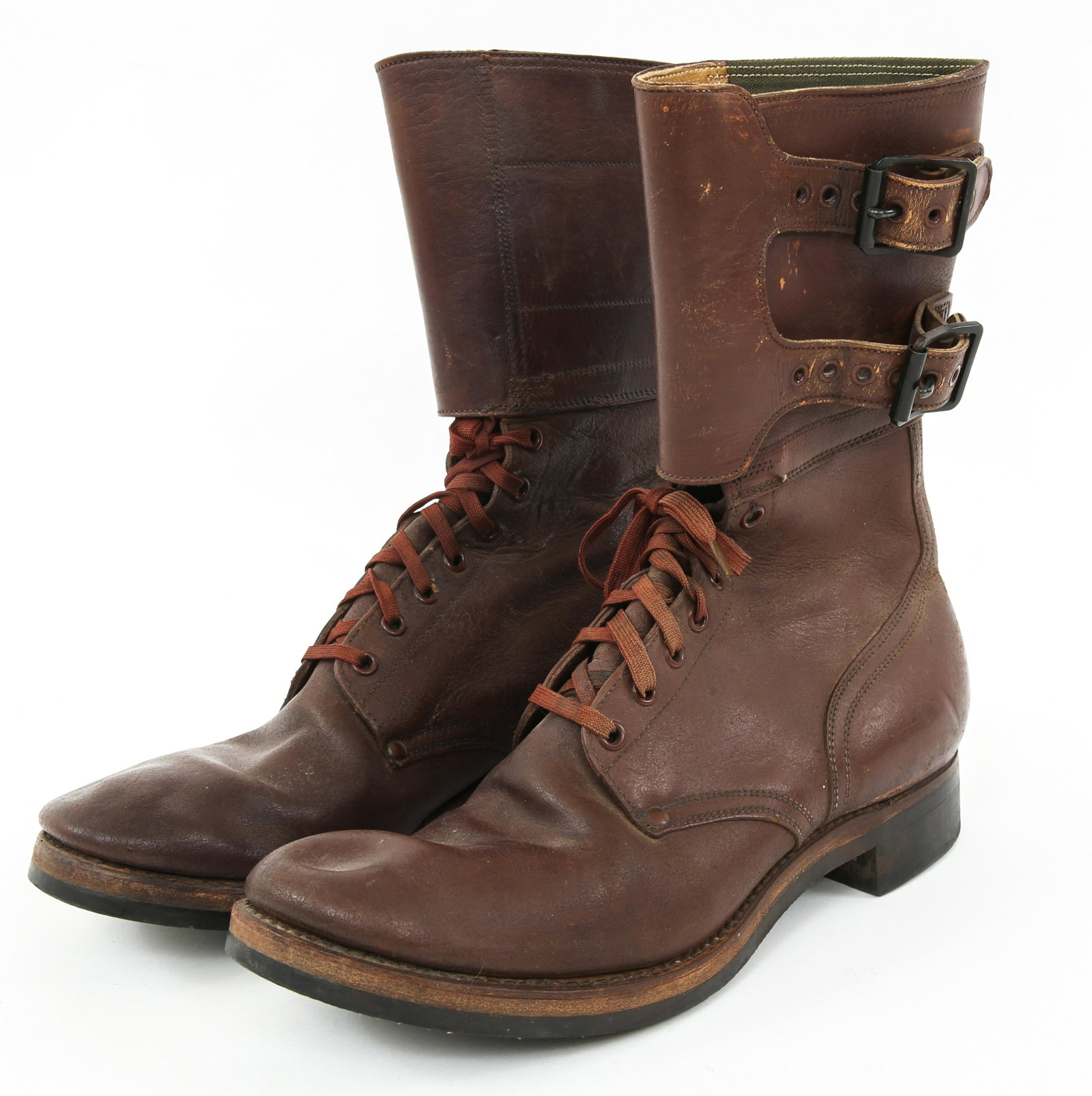 WWII US ARMY DOUBLE BUCKLES COMBAT BOOTS DATED 44: WWII US ARMY DOUBLE BUCKLES COMBAT BOOTS DATED 44 WWII US Army double buckle brown leather combat boots. Manufacture mark well stamped inside. Dated 1944. Size: 10.1/2B