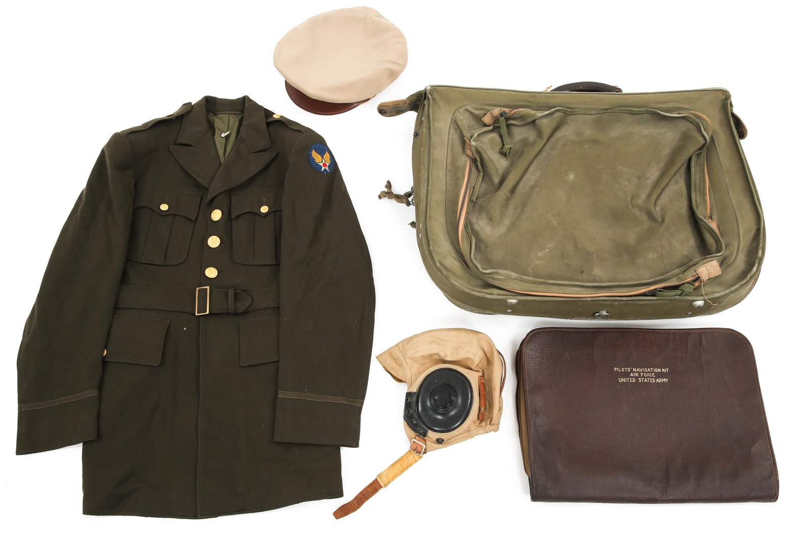 WWII US AAF PILOT OFFICER UNIFORM - HAT & SUITCASE: WWII US AAF PILOT OFFICER UNIFORM - HAT & SUITCASE WWII US Army Air Force Pilot / Aircrew officer uniform & suitcase. Includes (1) Officer dark OD elastic 4 pockets tunic. Named to " B.W. Lavery", dat
